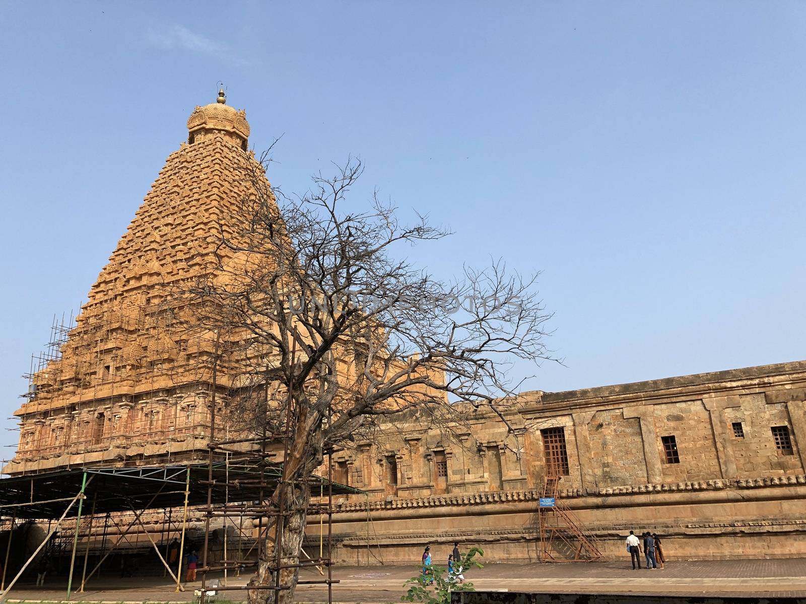 The Brihadisvara temple or Brihadeeswar temple located in Thanjavur, Tamilnadu built by Tamil King Raja Raja Chola-I between 1003 and 1010 AD. This is the Hindu temple built in Dravidian architecture style. The temple is entirely built with granite stones and the temple contains many monolithic sculptures in it. This temple is one of the `Great Living Chola Temples` and also tamil words are inscribed in the wall of the temple. This temple is dedicated to Lord shiva and it is a UNESCO World Heritage Site.