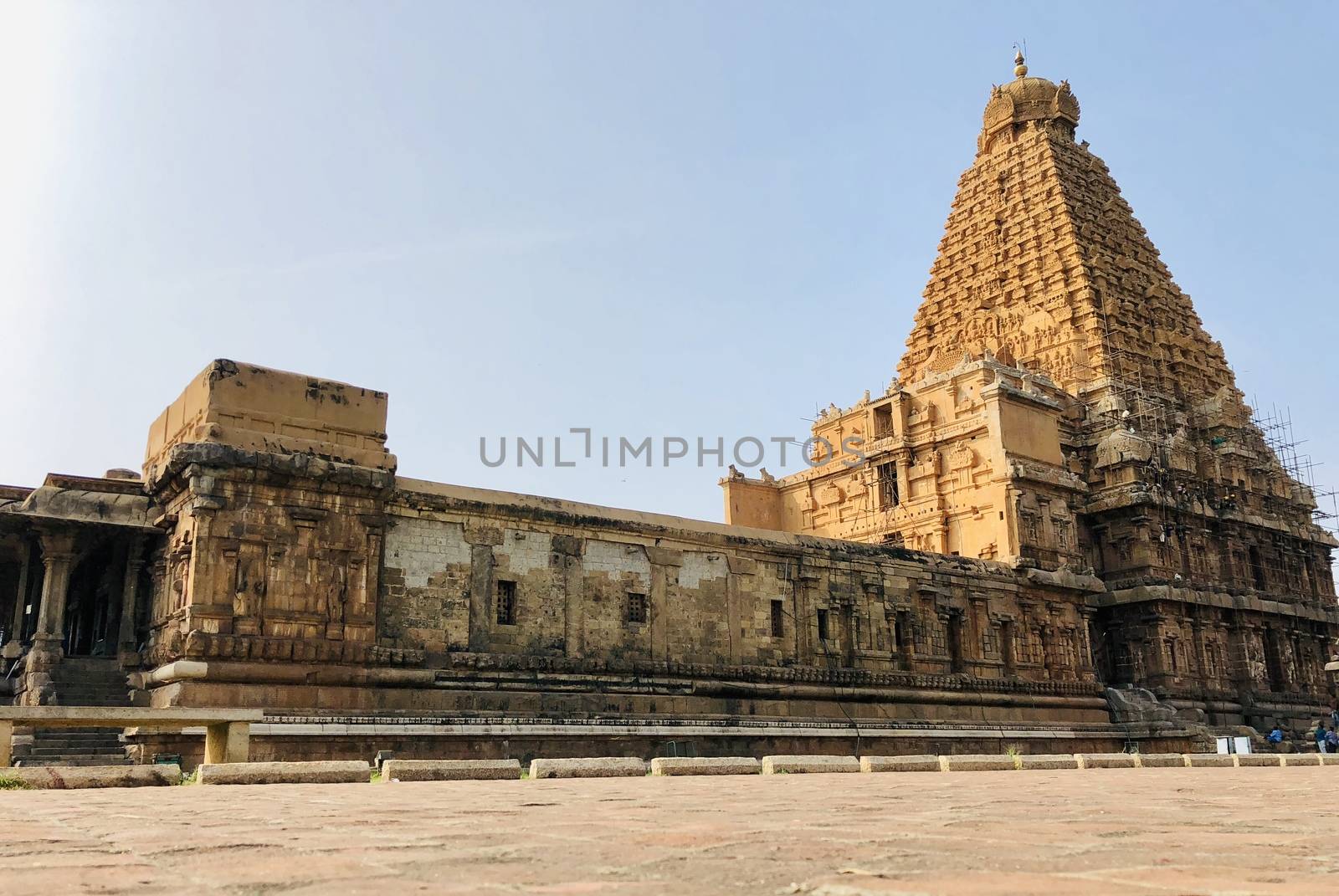 The Brihadisvara temple or Brihadeeswar temple located in Thanjavur, Tamilnadu built by Tamil King Raja Raja Chola-I between 1003 and 1010 AD. This is the Hindu temple built in Dravidian architecture style. The temple is entirely built with granite stones and the temple contains many monolithic sculptures in it. This temple is one of the `Great Living Chola Temples` and also tamil words are inscribed in the wall of the temple. This temple is dedicated to Lord shiva and it is a UNESCO World Heritage Site.
