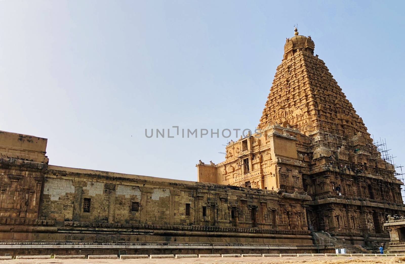 The Brihadisvara temple or Brihadeeswar temple located in Thanjavur, Tamilnadu built by Tamil King Raja Raja Chola-I between 1003 and 1010 AD. This is the Hindu temple built in Dravidian architecture style. The temple is entirely built with granite stones and the temple contains many monolithic sculptures in it. This temple is one of the `Great Living Chola Temples` and also tamil words are inscribed in the wall of the temple. This temple is dedicated to Lord shiva and it is a UNESCO World Heritage Site.