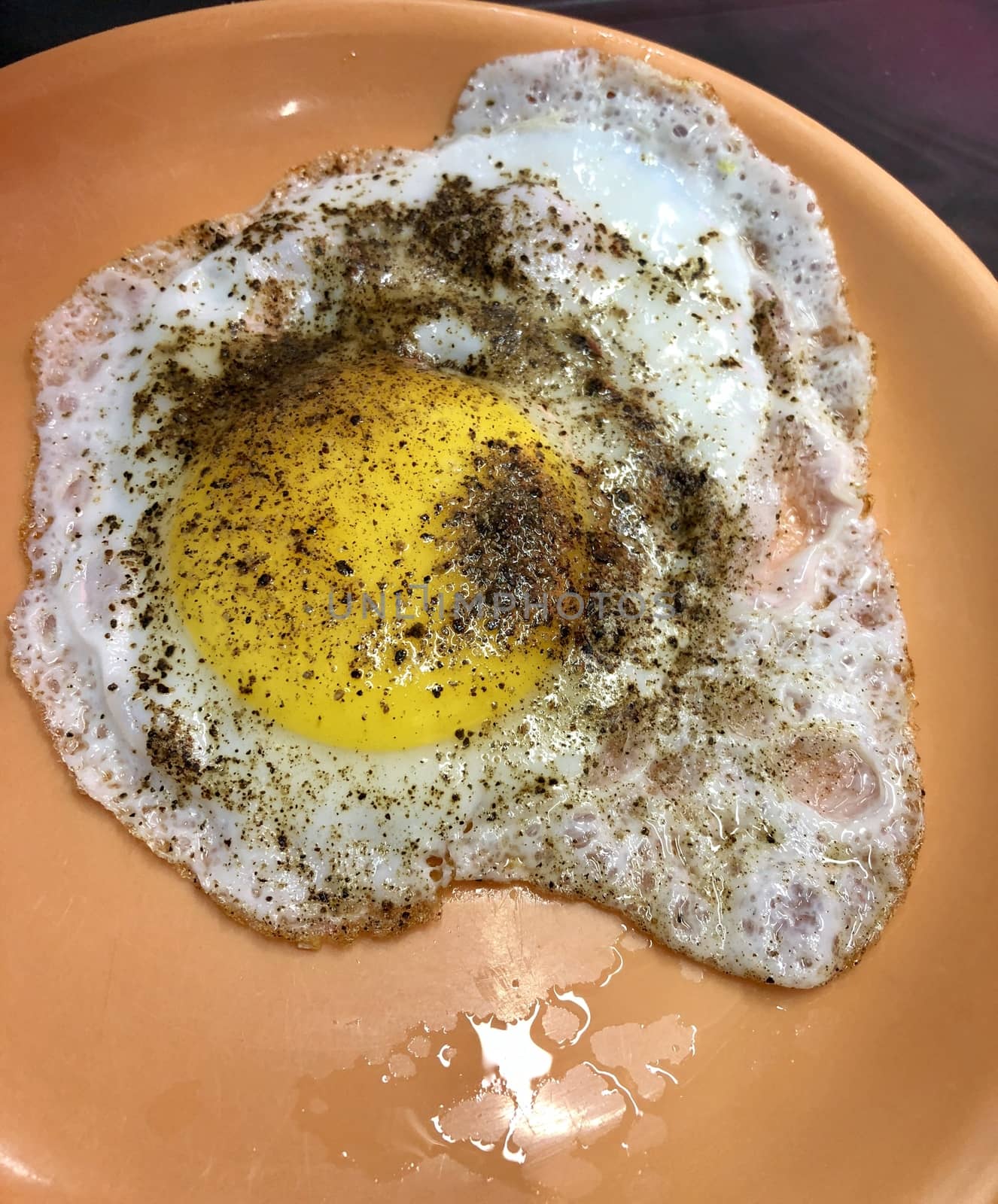 View of half boiled egg served in the restaurant