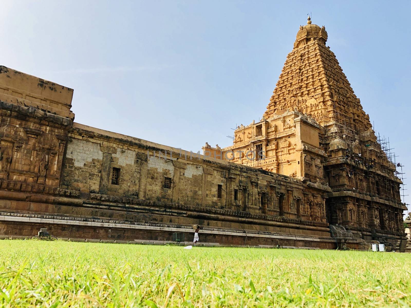 The Brihadisvara temple or Brihadeeswar temple located in Thanjavur, Tamilnadu built by Tamil King Raja Raja Chola-I between 1003 and 1010 AD. This is the Hindu temple built in Dravidian architecture style. The temple is entirely built with granite stones and the temple contains many monolithic sculptures in it. This temple is one of the `Great Living Chola Temples` and also tamil words are inscribed in the wall of the temple. This temple is dedicated to Lord shiva and it is a UNESCO World Heritage Site.