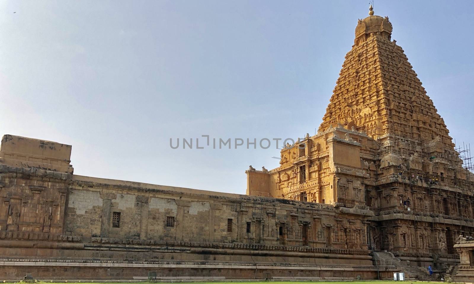 The Brihadisvara temple or Brihadeeswar temple located in Thanjavur, Tamilnadu built by Tamil King Raja Raja Chola-I between 1003 and 1010 AD. This is the Hindu temple built in Dravidian architecture style. The temple is entirely built with granite stones and the temple contains many monolithic sculptures in it. This temple is one of the `Great Living Chola Temples` and also tamil words are inscribed in the wall of the temple. This temple is dedicated to Lord shiva and it is a UNESCO World Heritage Site.