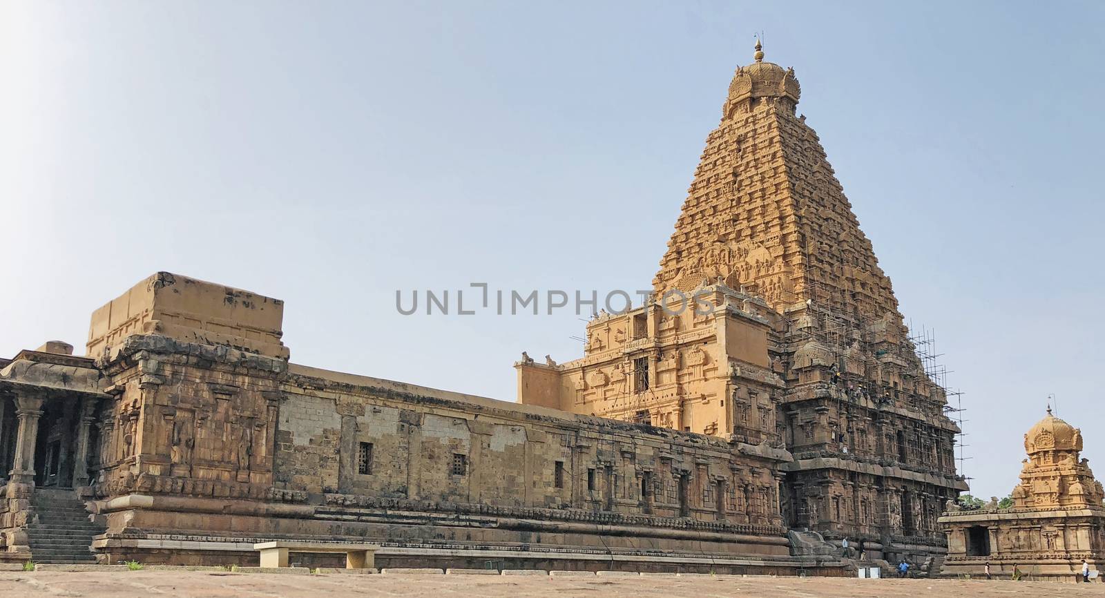The Brihadisvara temple or Brihadeeswar temple located in Thanjavur, Tamilnadu built by Tamil King Raja Raja Chola-I between 1003 and 1010 AD. This is the Hindu temple built in Dravidian architecture style. The temple is entirely built with granite stones and the temple contains many monolithic sculptures in it. This temple is one of the `Great Living Chola Temples` and also tamil words are inscribed in the wall of the temple. This temple is dedicated to Lord shiva and it is a UNESCO World Heritage Site.