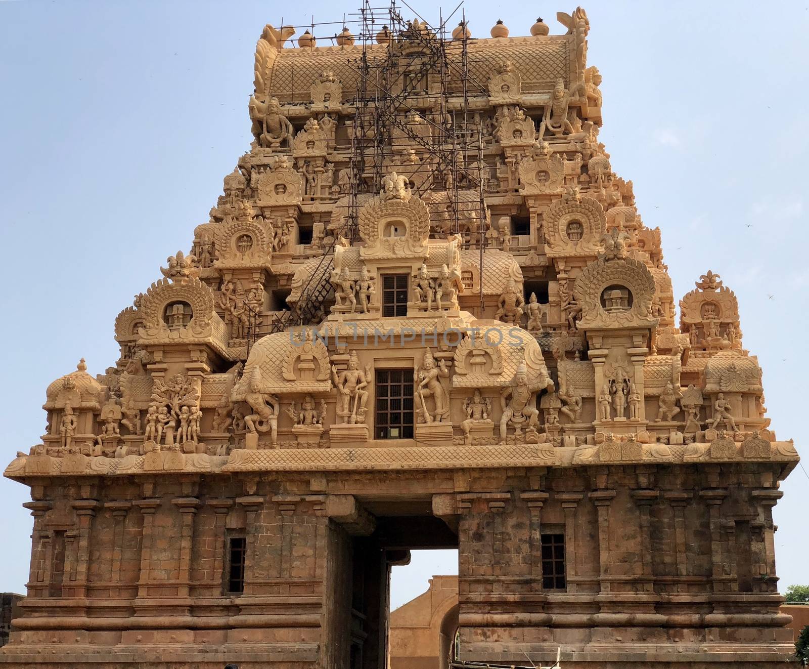 The Brihadisvara temple or Brihadeeswar temple located in Thanjavur, Tamilnadu built by Tamil King Raja Raja Chola-I between 1003 and 1010 AD. This is the Hindu temple built in Dravidian architecture style. The temple is entirely built with granite stones and the temple contains many monolithic sculptures in it. This temple is one of the `Great Living Chola Temples` and also tamil words are inscribed in the wall of the temple. This temple is dedicated to Lord shiva and it is a UNESCO World Heritage Site.