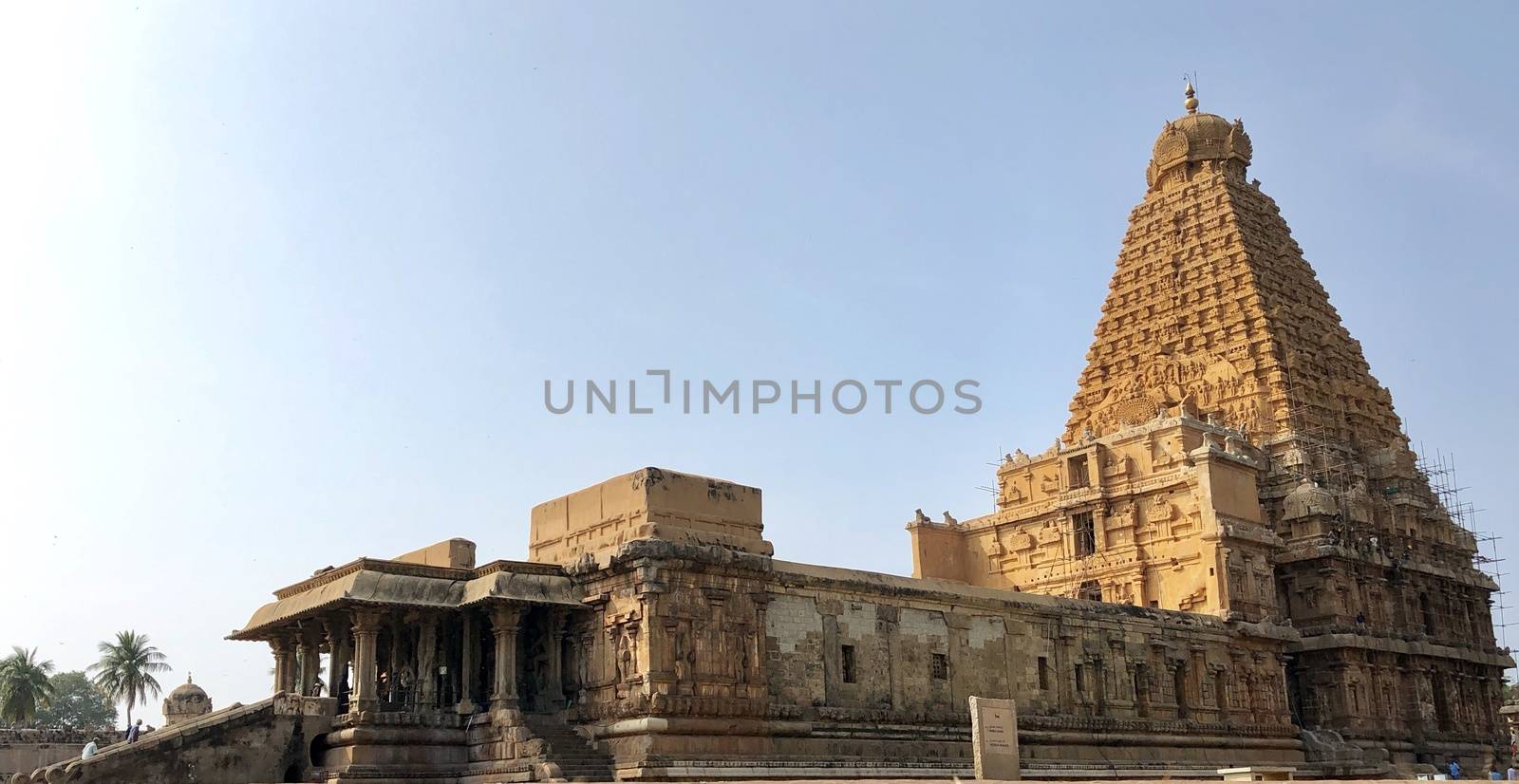 The Brihadisvara temple or Brihadeeswar temple located in Thanjavur, Tamilnadu built by Tamil King Raja Raja Chola-I between 1003 and 1010 AD. This is the Hindu temple built in Dravidian architecture style. The temple is entirely built with granite stones and the temple contains many monolithic sculptures in it. This temple is one of the `Great Living Chola Temples` and also tamil words are inscribed in the wall of the temple. This temple is dedicated to Lord shiva and it is a UNESCO World Heritage Site.