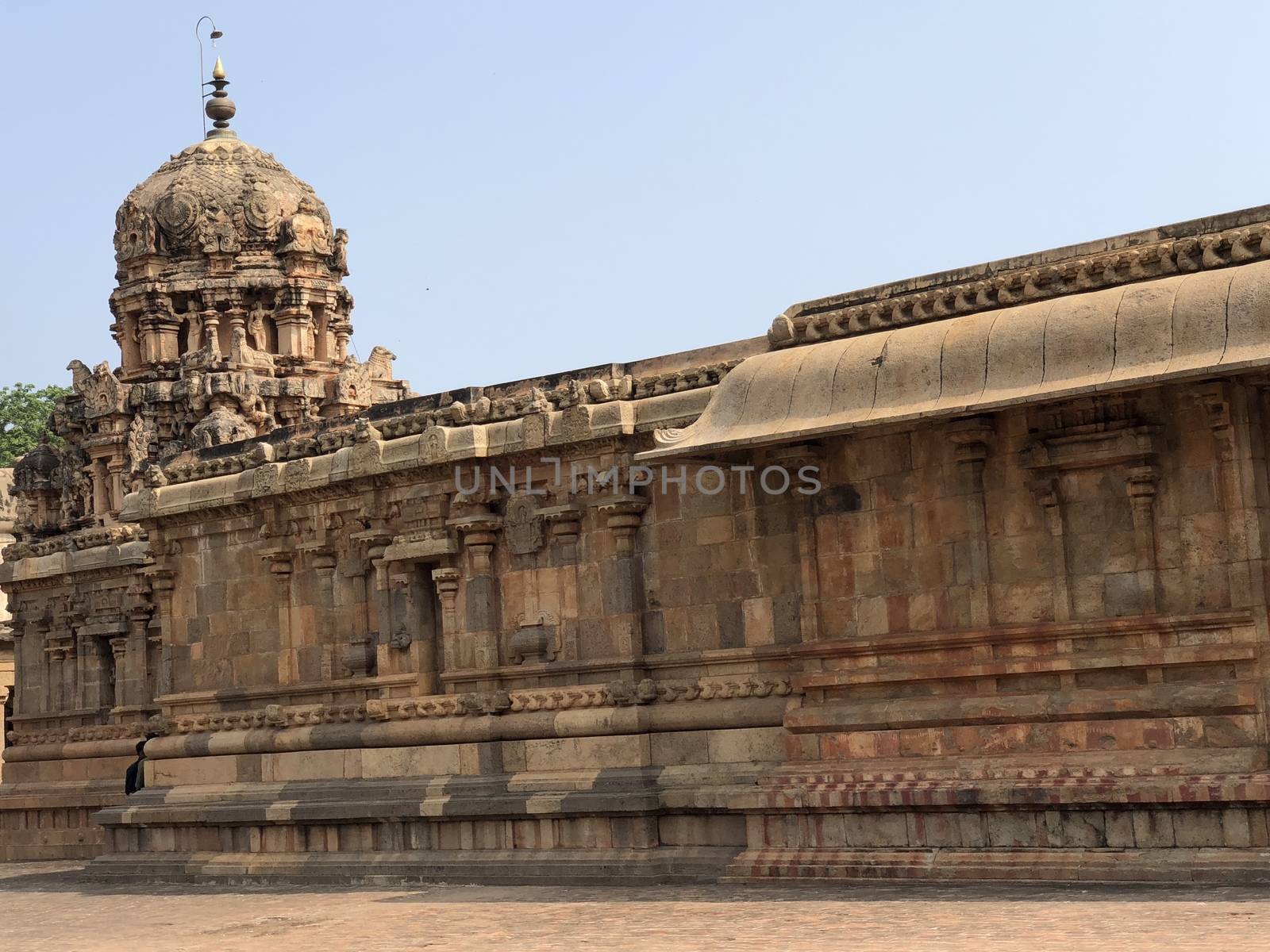The Brihadisvara temple or Brihadeeswar temple located in Thanjavur, Tamilnadu built by Tamil King Raja Raja Chola-I between 1003 and 1010 AD. This is the Hindu temple built in Dravidian architecture style. The temple is entirely built with granite stones and the temple contains many monolithic sculptures in it. This temple is one of the `Great Living Chola Temples` and also tamil words are inscribed in the wall of the temple. This temple is dedicated to Lord shiva and it is a UNESCO World Heritage Site.