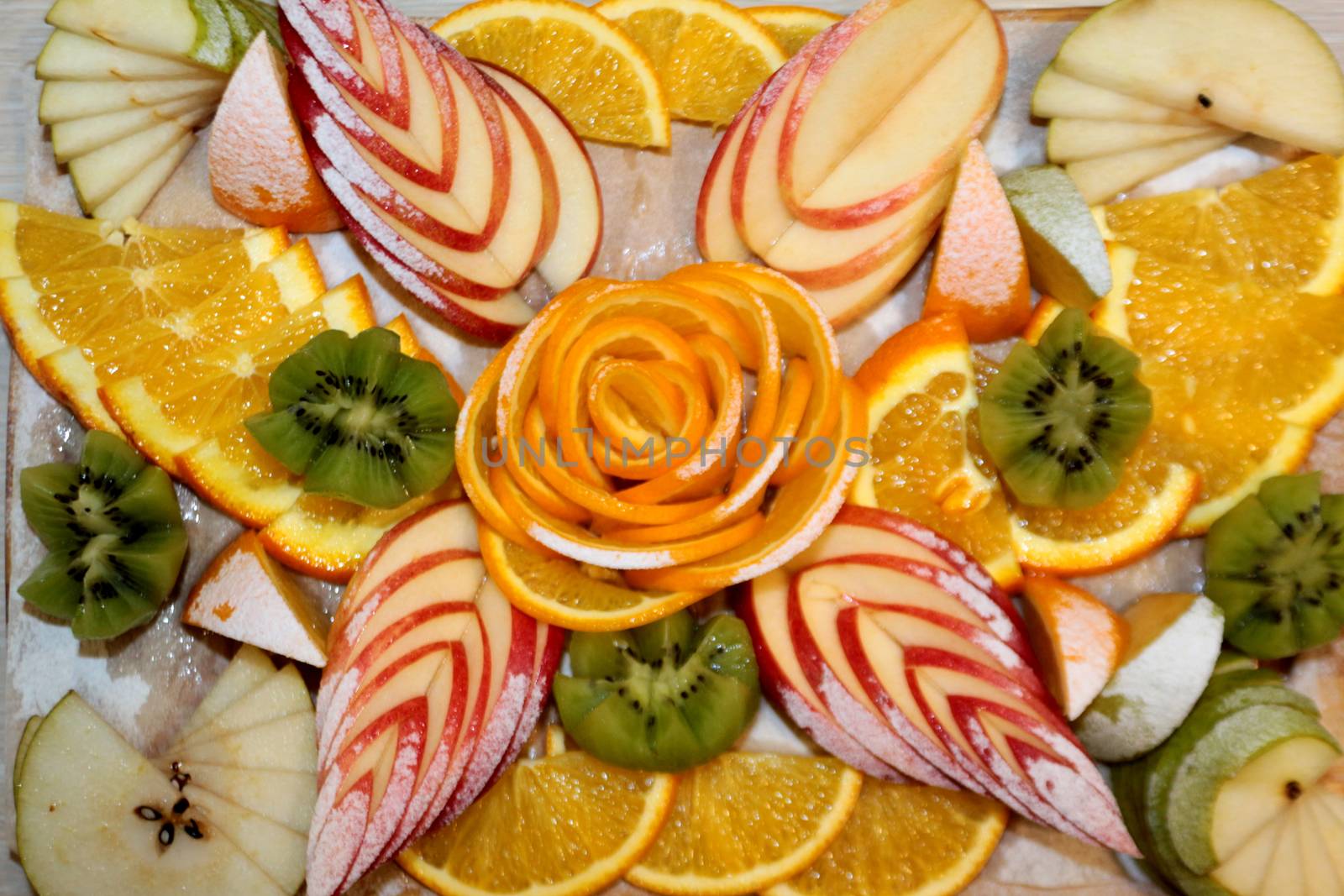 Vegan food fruit salad of kiwi, orange, citrus and Apple. Vitamin Breakfast and fresh fruit salad for a healthy lifestyle.