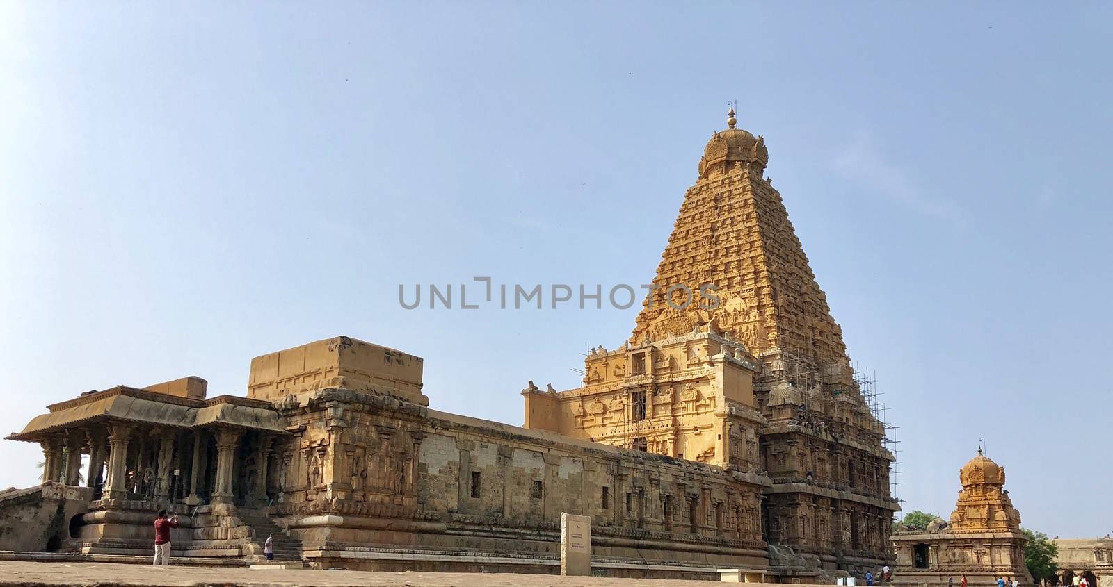 The Brihadisvara temple or Brihadeeswar temple located in Thanjavur, Tamilnadu built by Tamil King Raja Raja Chola-I between 1003 and 1010 AD. This is the Hindu temple built in Dravidian architecture style. The temple is entirely built with granite stones and the temple contains many monolithic sculptures in it. This temple is one of the `Great Living Chola Temples` and also tamil words are inscribed in the wall of the temple. This temple is dedicated to Lord shiva and it is a UNESCO World Heritage Site.
