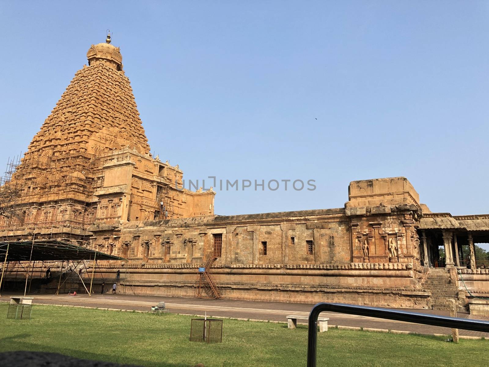 The Brihadisvara temple or Brihadeeswar temple located in Thanjavur, Tamilnadu built by Tamil King Raja Raja Chola-I between 1003 and 1010 AD. This is the Hindu temple built in Dravidian architecture style. The temple is entirely built with granite stones and the temple contains many monolithic sculptures in it. This temple is one of the `Great Living Chola Temples` and also tamil words are inscribed in the wall of the temple. This temple is dedicated to Lord shiva and it is a UNESCO World Heritage Site.