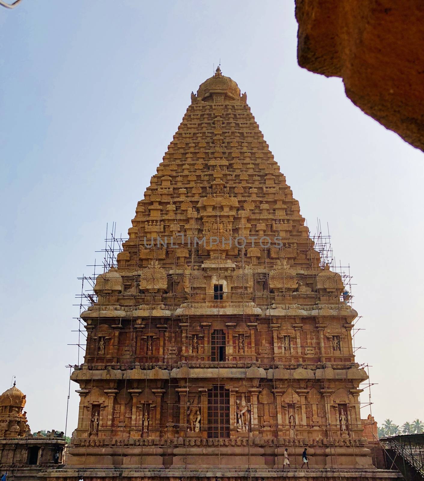 The Brihadisvara temple or Brihadeeswar temple located in Thanjavur, Tamilnadu built by Tamil King Raja Raja Chola-I between 1003 and 1010 AD. This is the Hindu temple built in Dravidian architecture style. The temple is entirely built with granite stones and the temple contains many monolithic sculptures in it. This temple is one of the `Great Living Chola Temples` and also tamil words are inscribed in the wall of the temple. This temple is dedicated to Lord shiva and it is a UNESCO World Heritage Site.