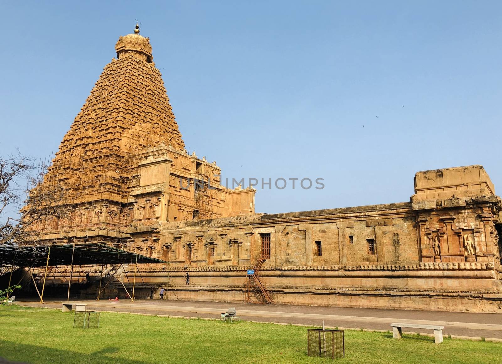 The Brihadisvara temple or Brihadeeswar temple located in Thanjavur, Tamilnadu built by Tamil King Raja Raja Chola-I between 1003 and 1010 AD. This is the Hindu temple built in Dravidian architecture style. The temple is entirely built with granite stones and the temple contains many monolithic sculptures in it. This temple is one of the `Great Living Chola Temples` and also tamil words are inscribed in the wall of the temple. This temple is dedicated to Lord shiva and it is a UNESCO World Heritage Site.