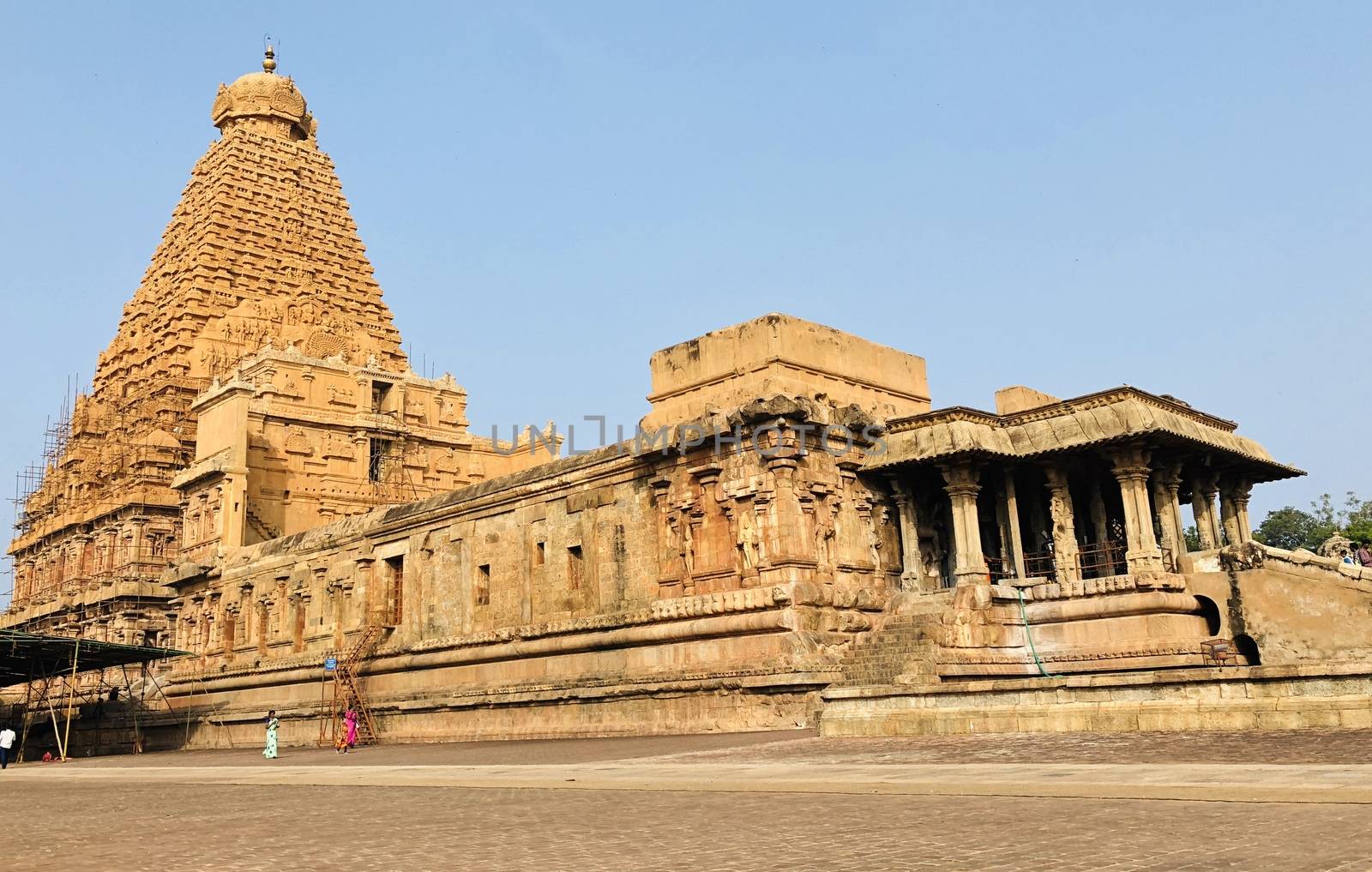 The Brihadisvara temple or Brihadeeswar temple located in Thanjavur, Tamilnadu built by Tamil King Raja Raja Chola-I between 1003 and 1010 AD. This is the Hindu temple built in Dravidian architecture style. The temple is entirely built with granite stones and the temple contains many monolithic sculptures in it. This temple is one of the `Great Living Chola Temples` and also tamil words are inscribed in the wall of the temple. This temple is dedicated to Lord shiva and it is a UNESCO World Heritage Site.