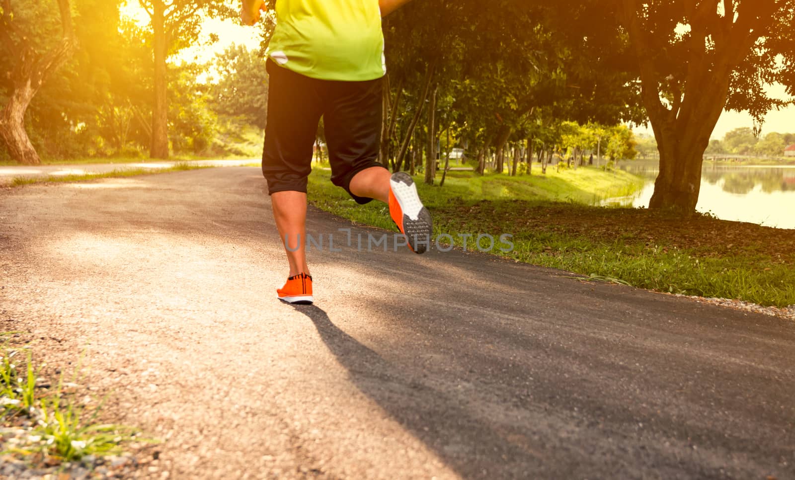 A man running at the morning for jogging and exercise.