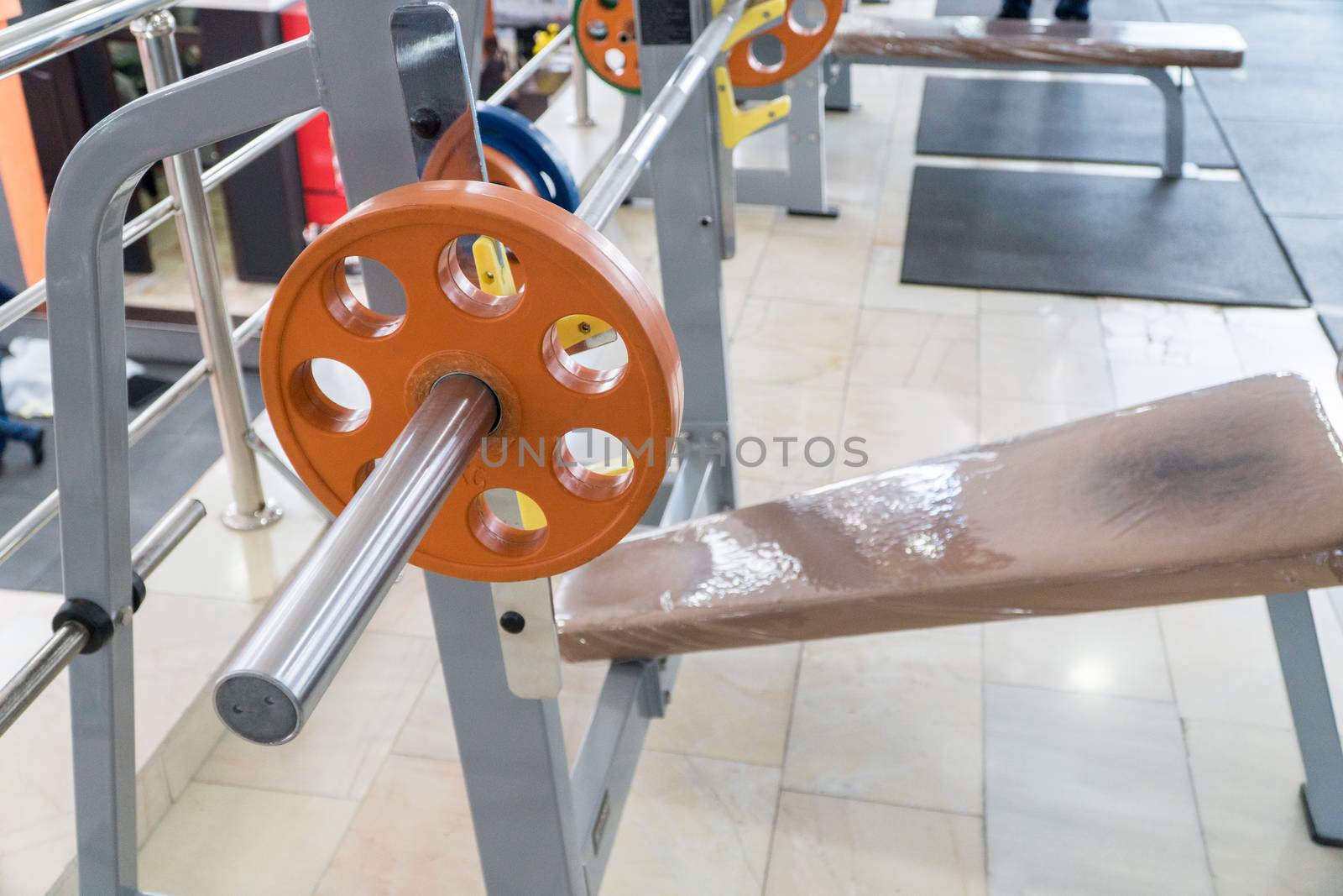 sports equipment and barbells in the gym, close-up