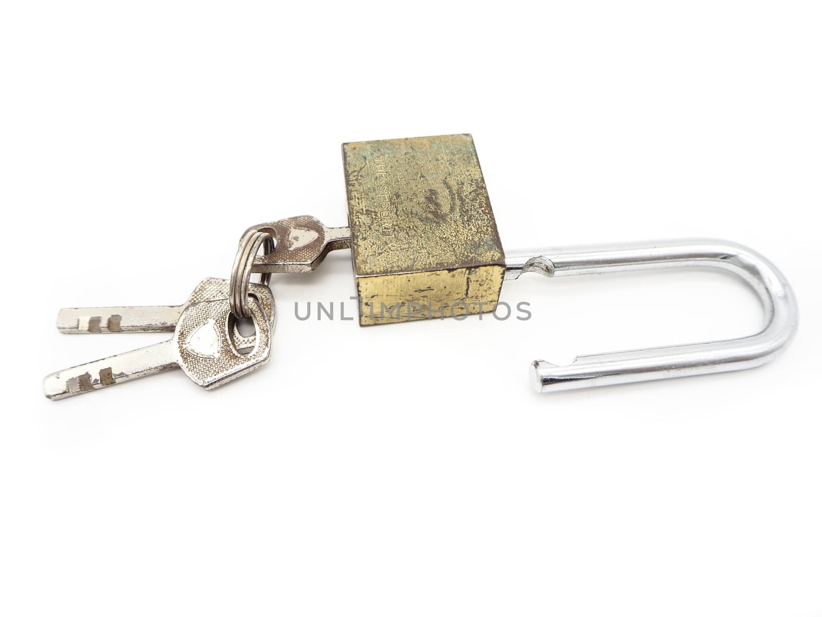 Keys stuck in a old lock isolated on a white background.