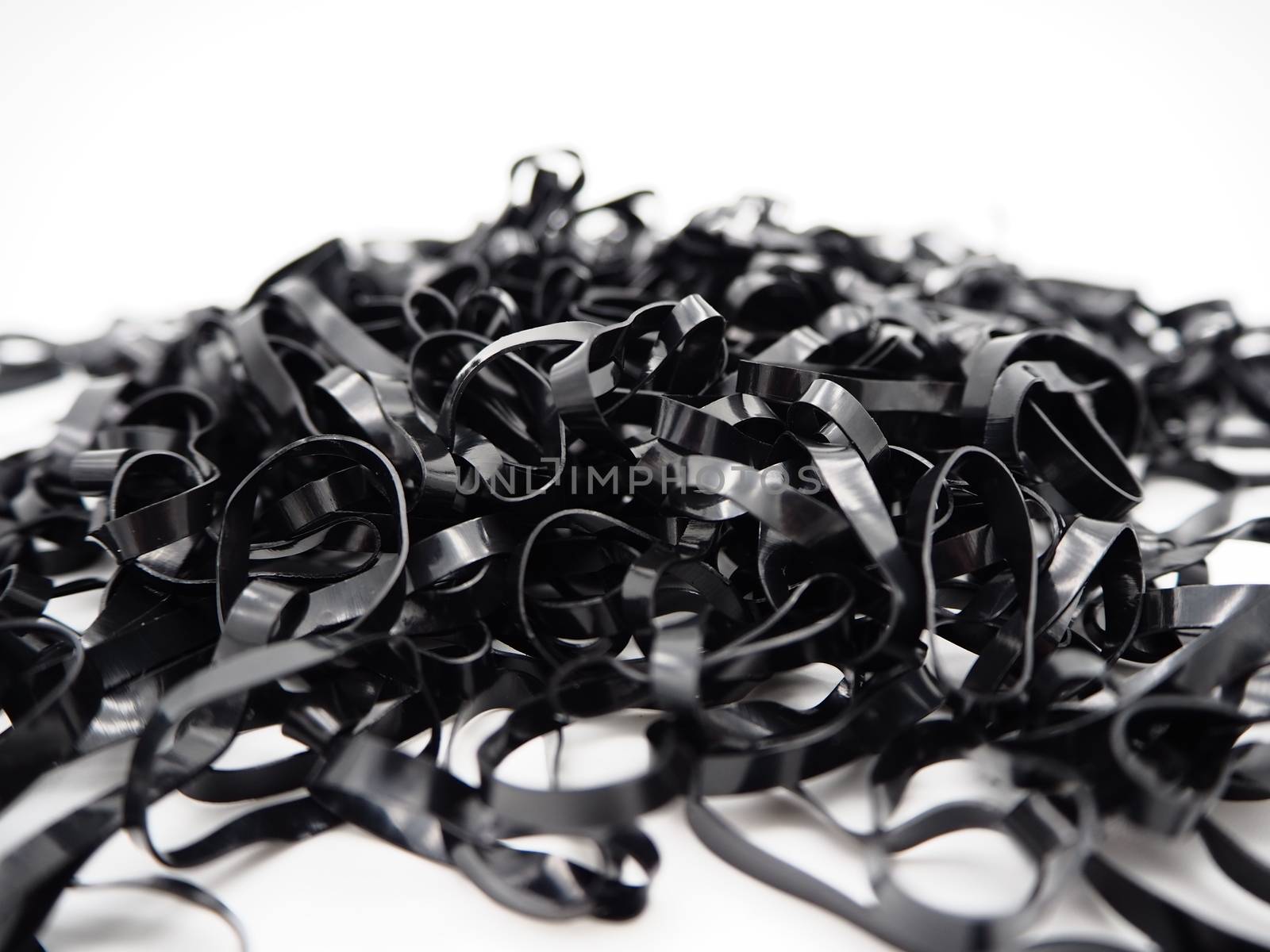 Black and small rubber band isolated on white background.