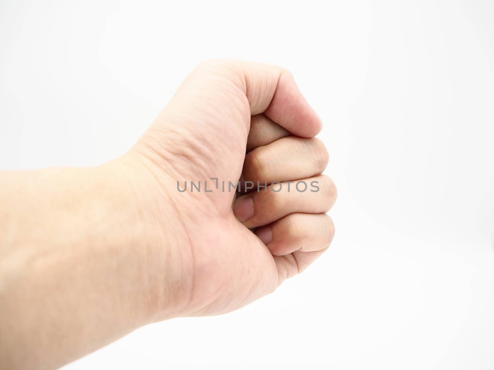 Man clenched fist isolated on a white background.