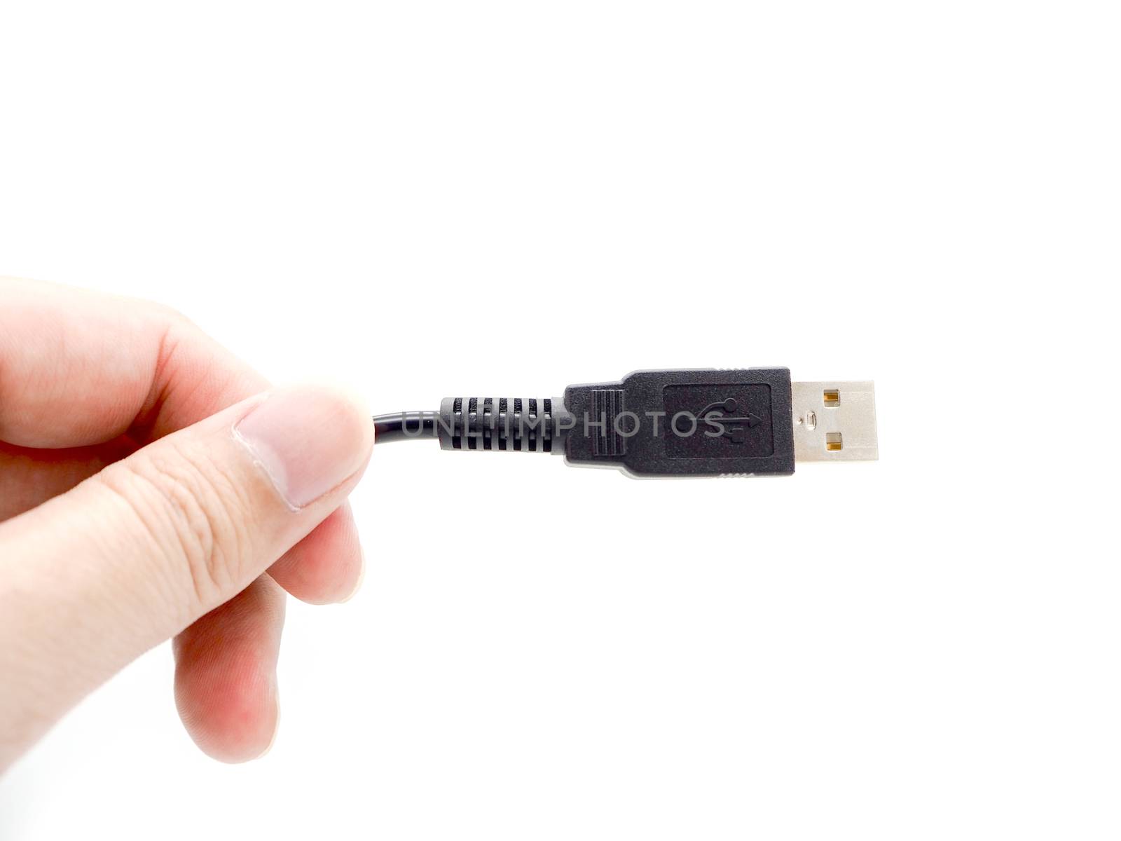 Hand holding USB cable isolated on a white background.
