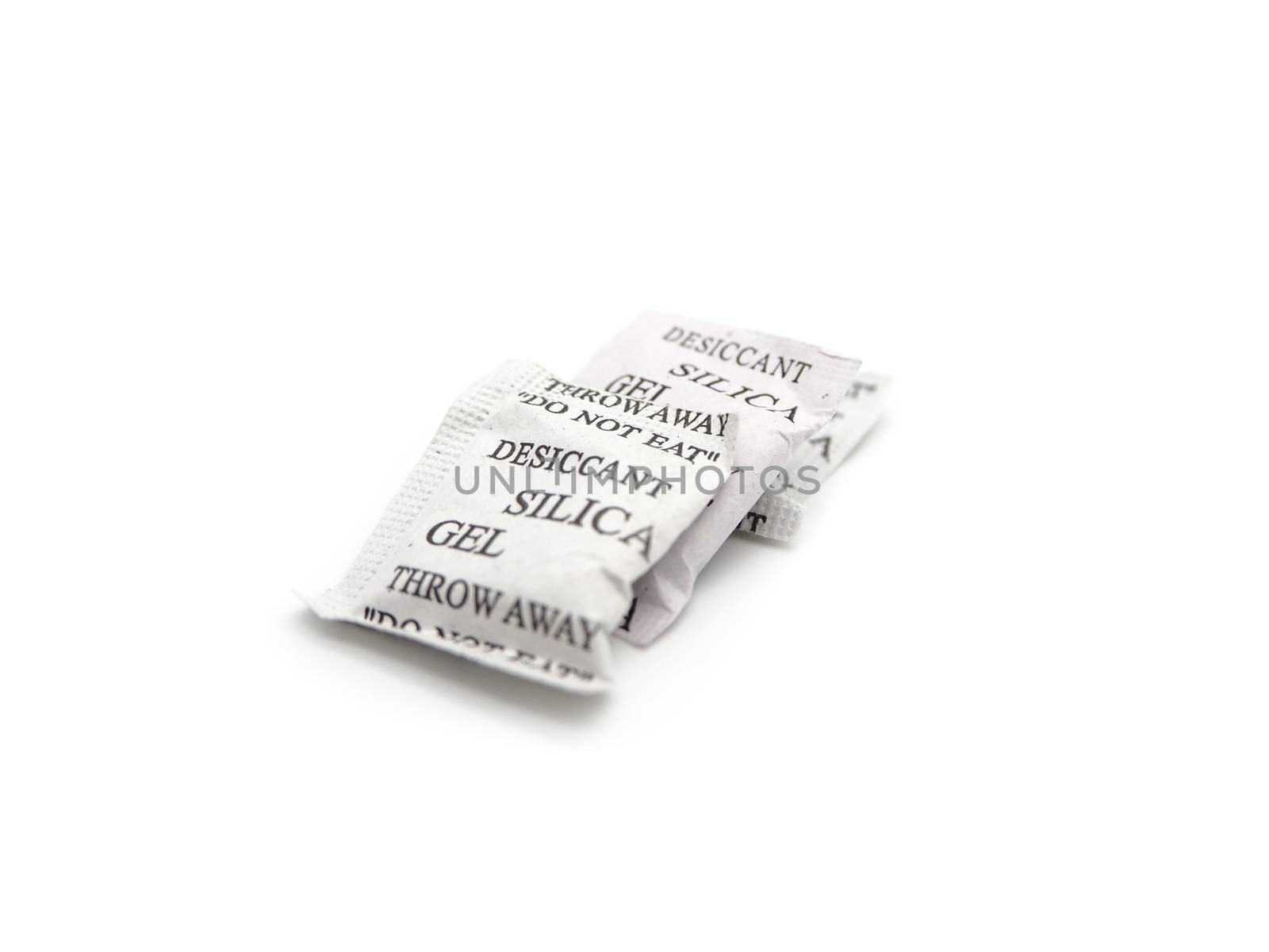 Silica gel packets isolated on a white background.