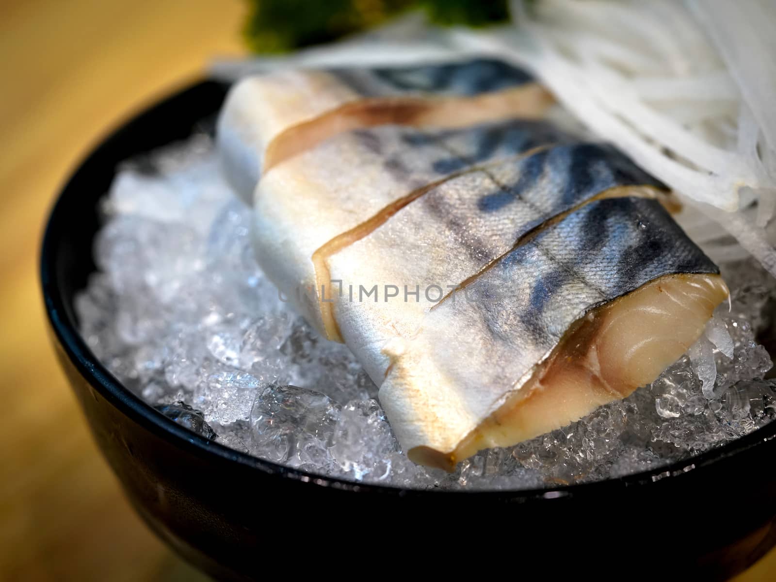 Japanese Cuisine - Close up Saba sashimi served on ice by chadchai_k