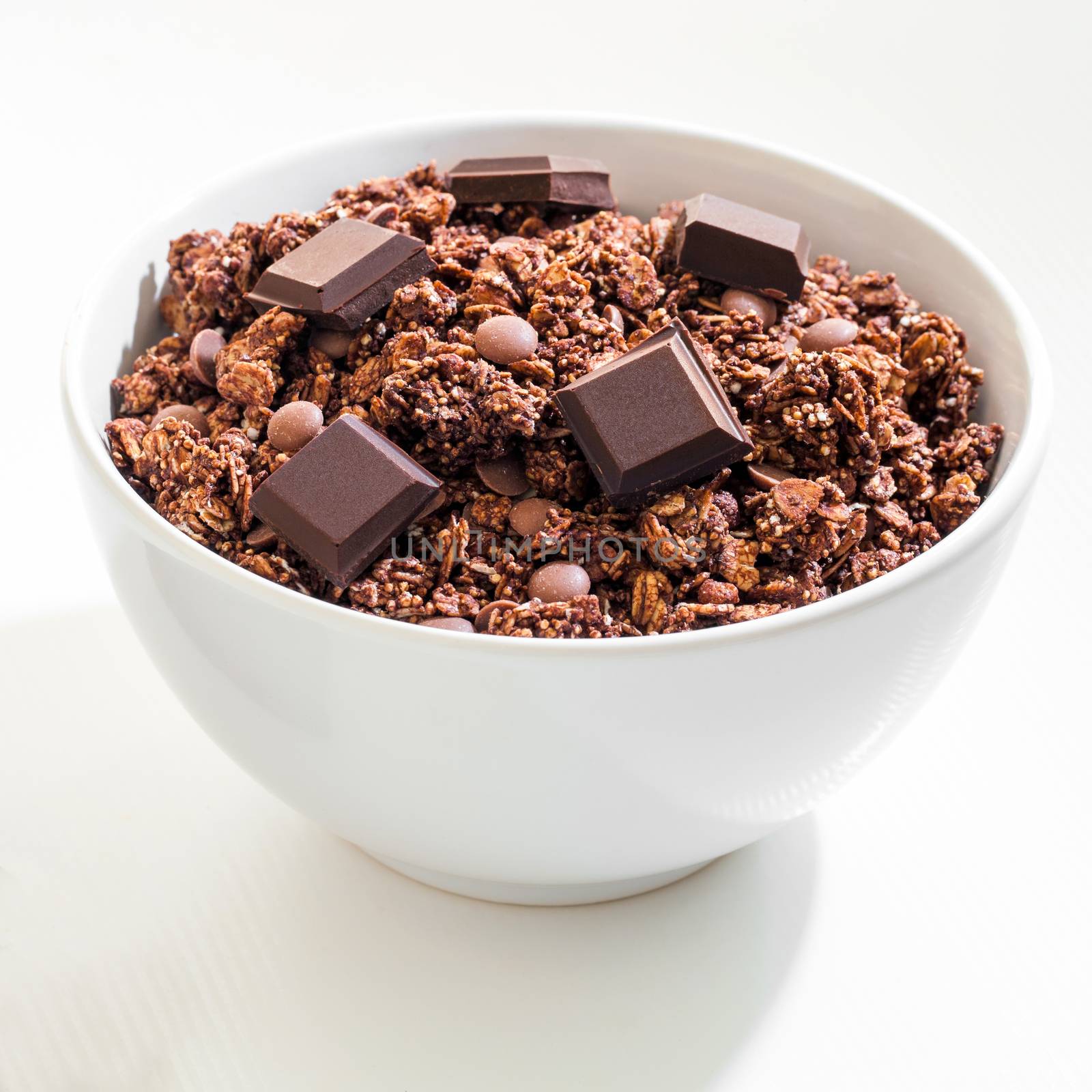 Bowl of chocolate muesli. by karelnoppe