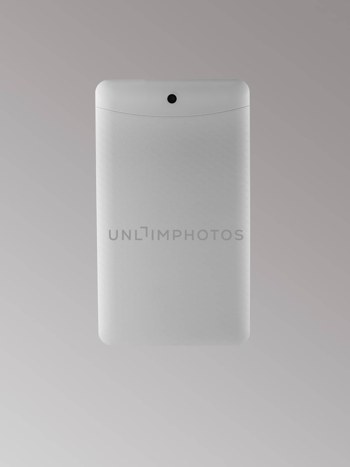 the back side of the tablet on a light background, isolated