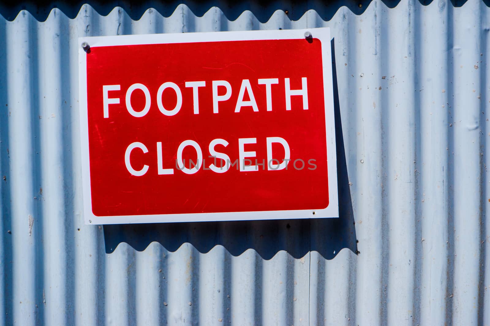 footpath closed red warning sign in Kendal UK