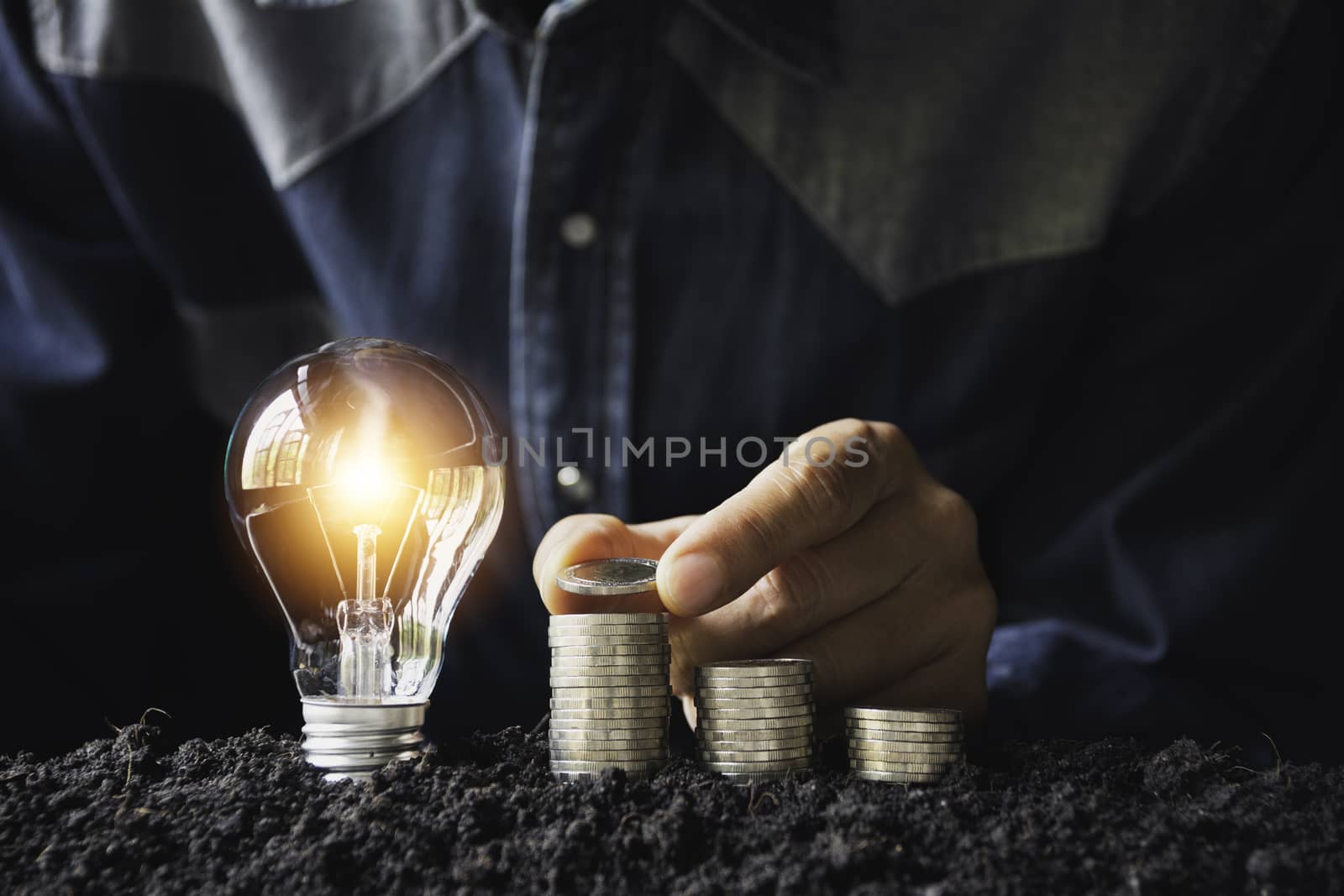 Hand drop a coin with money coin stack growing for business. financial and accounting concept.