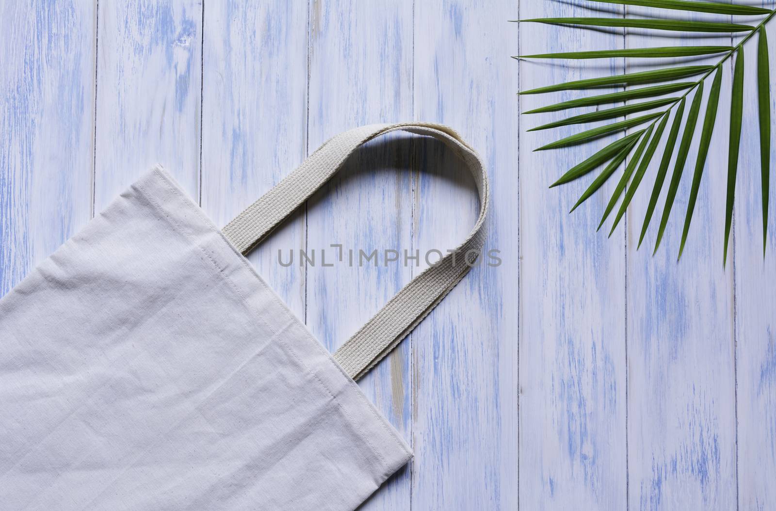 White tote bag canvas fabric. Cloth shopping sack mockup with copy space.