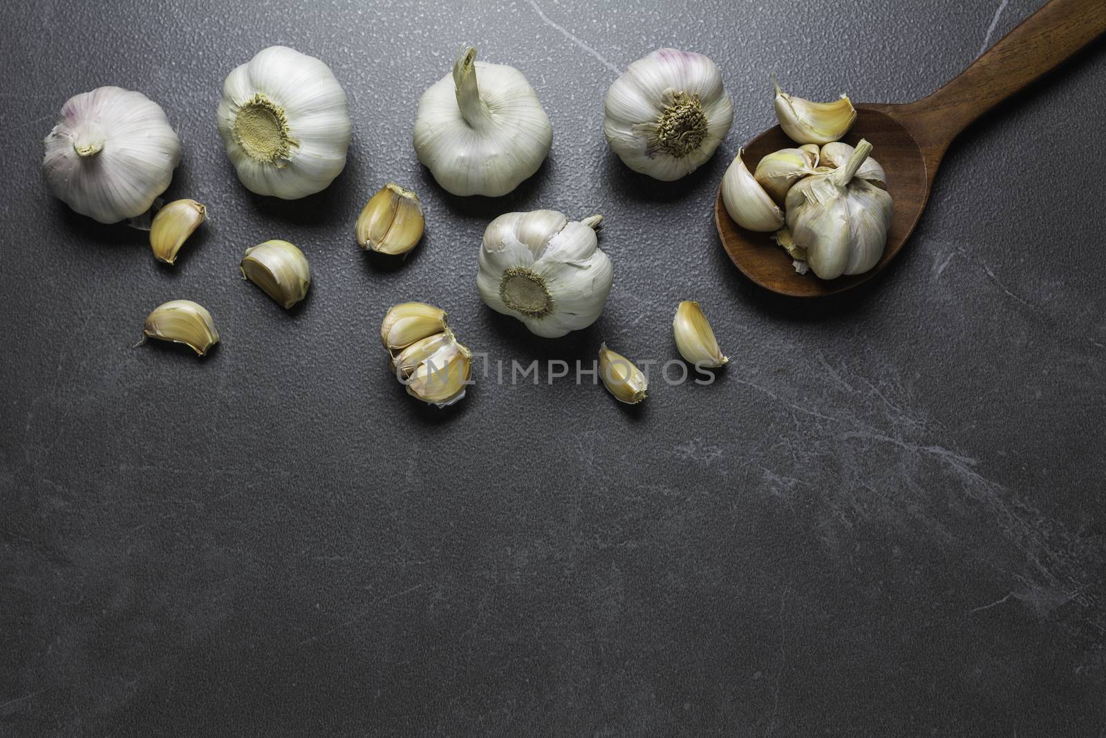 Fresh Garlic sliced and garlic bulb with copy space concept of food and healthy. 