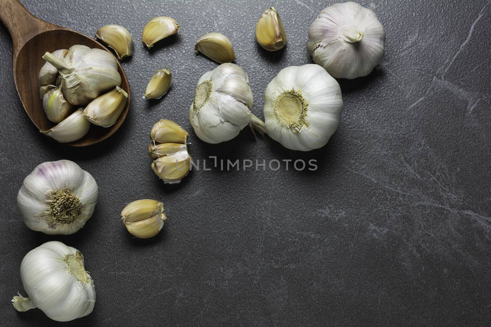 Fresh Garlic sliced and garlic bulb with copy space concept of food and healthy. 