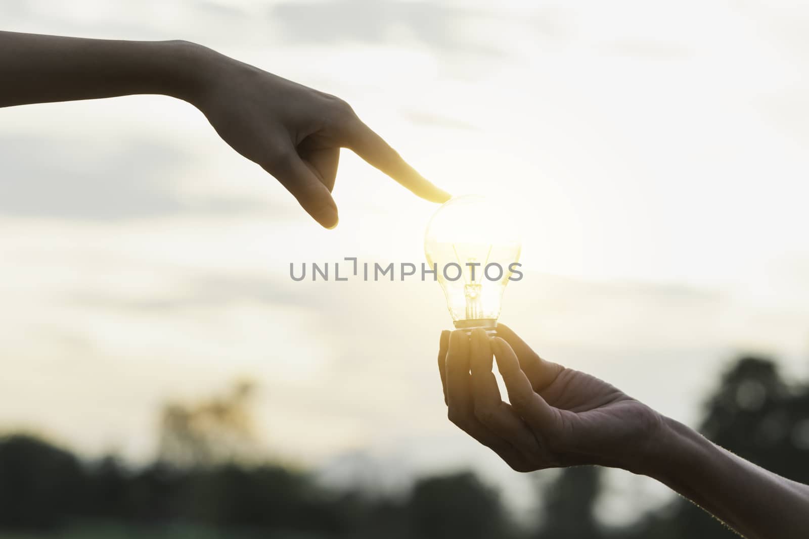 Innovation or creative concept of hand hold a light bulb and copy space for insert text.