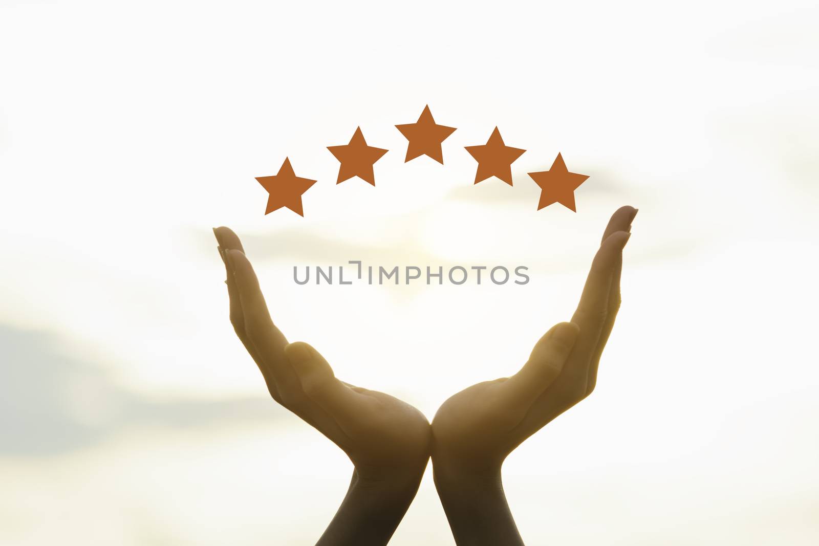 Hand of people hand raising up with five star on sky background.