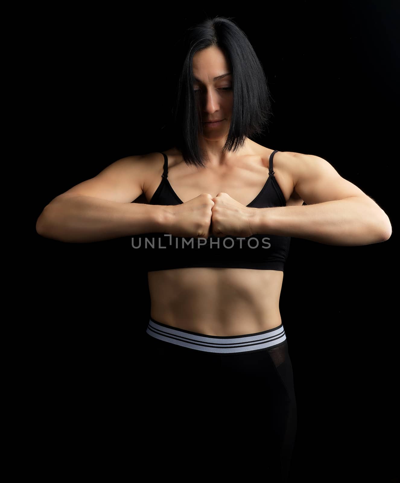 beautiful girl with black hair, athletic appearance, fists in fr by ndanko