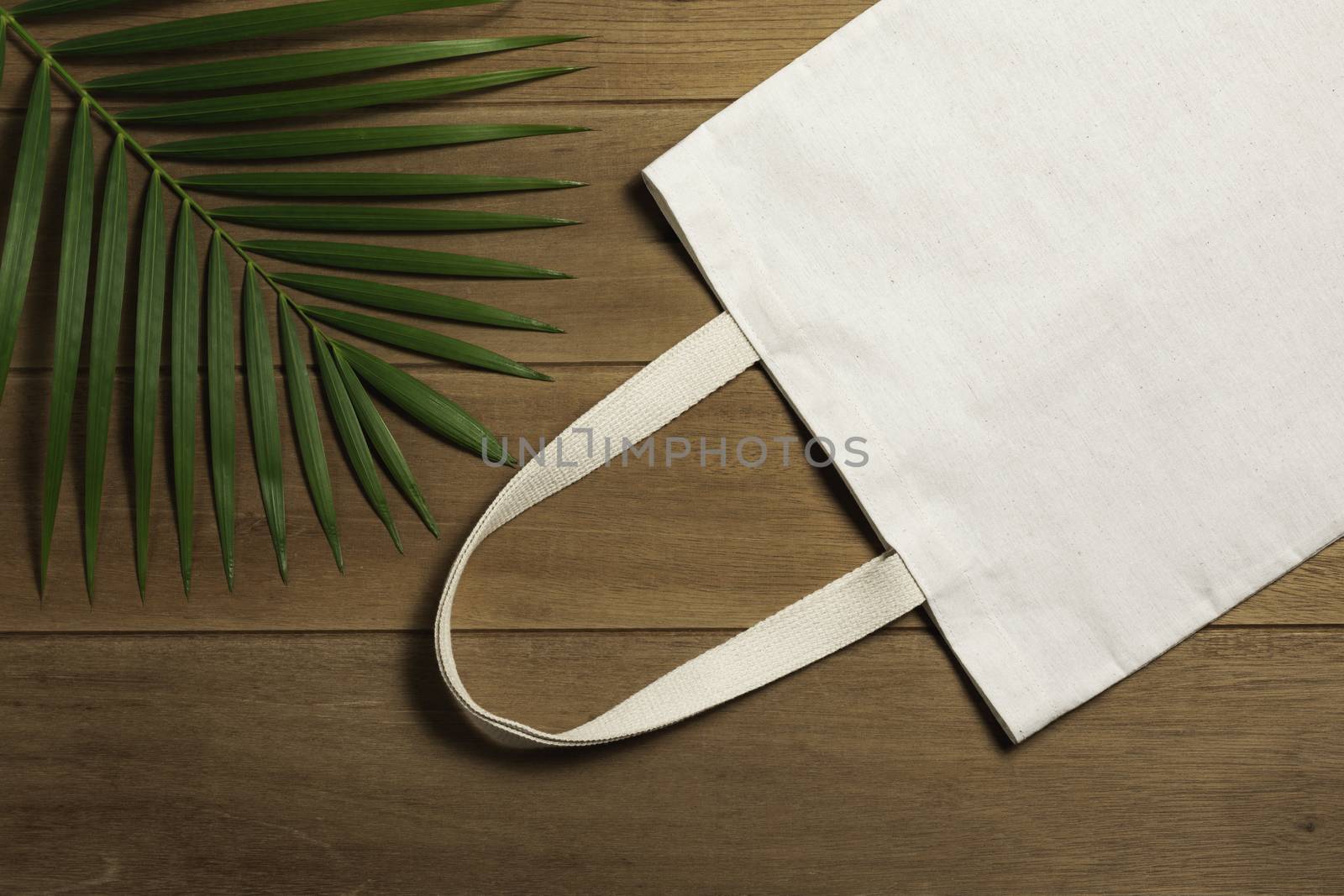 White tote bag canvas fabric. Cloth shopping sack mockup with copy space.
