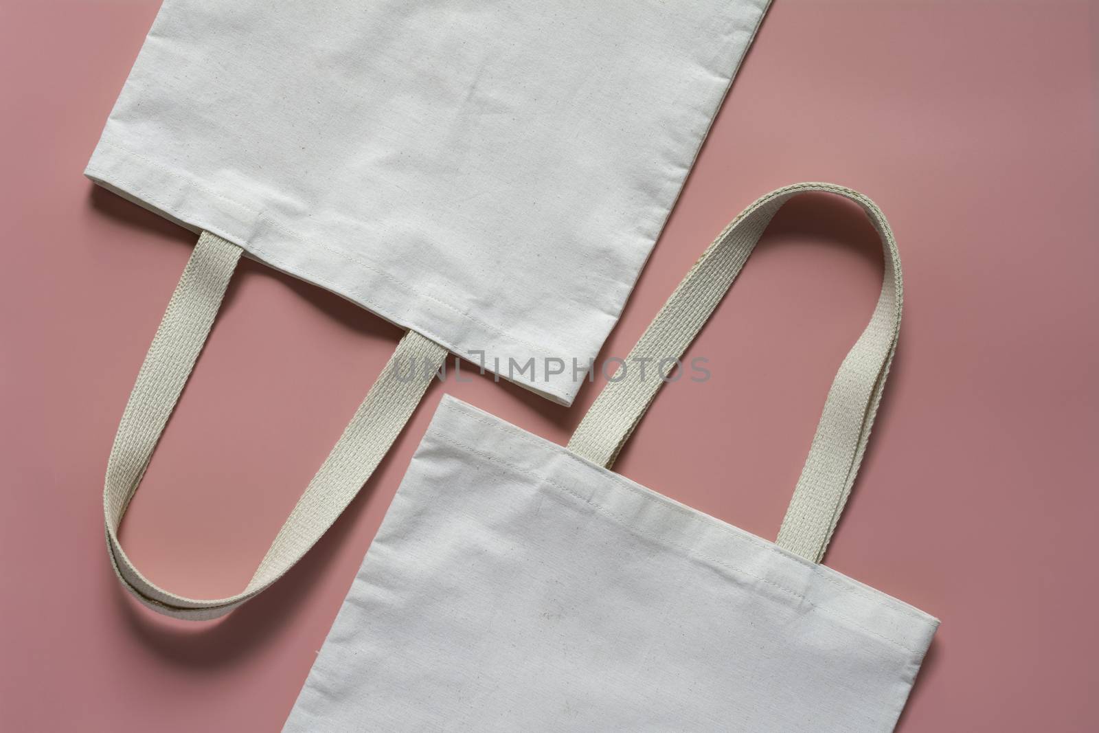 White tote bag canvas fabric. Cloth shopping sack mockup with copy space.