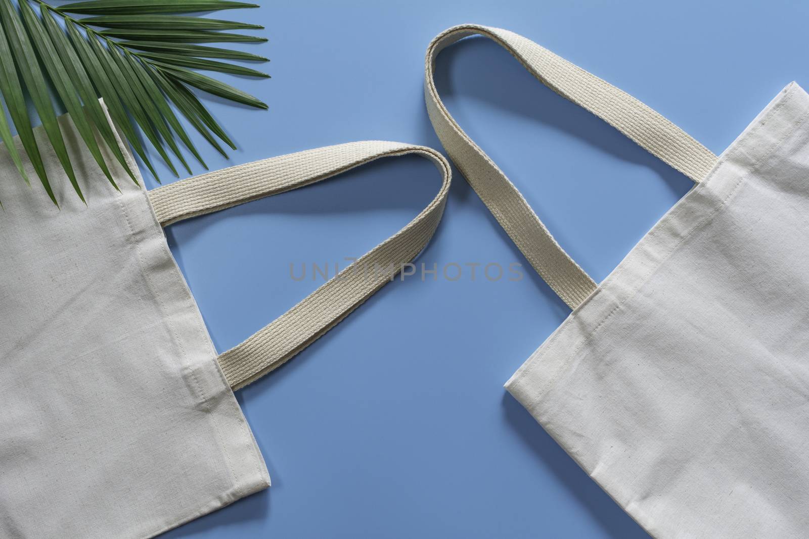 White tote bag canvas fabric. Cloth shopping sack mockup with copy space.