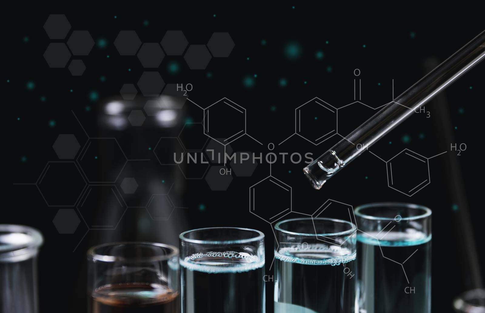 Glass laboratory chemical test tubes with liquid for analytical , medical, pharmaceutical and scientific research concept.