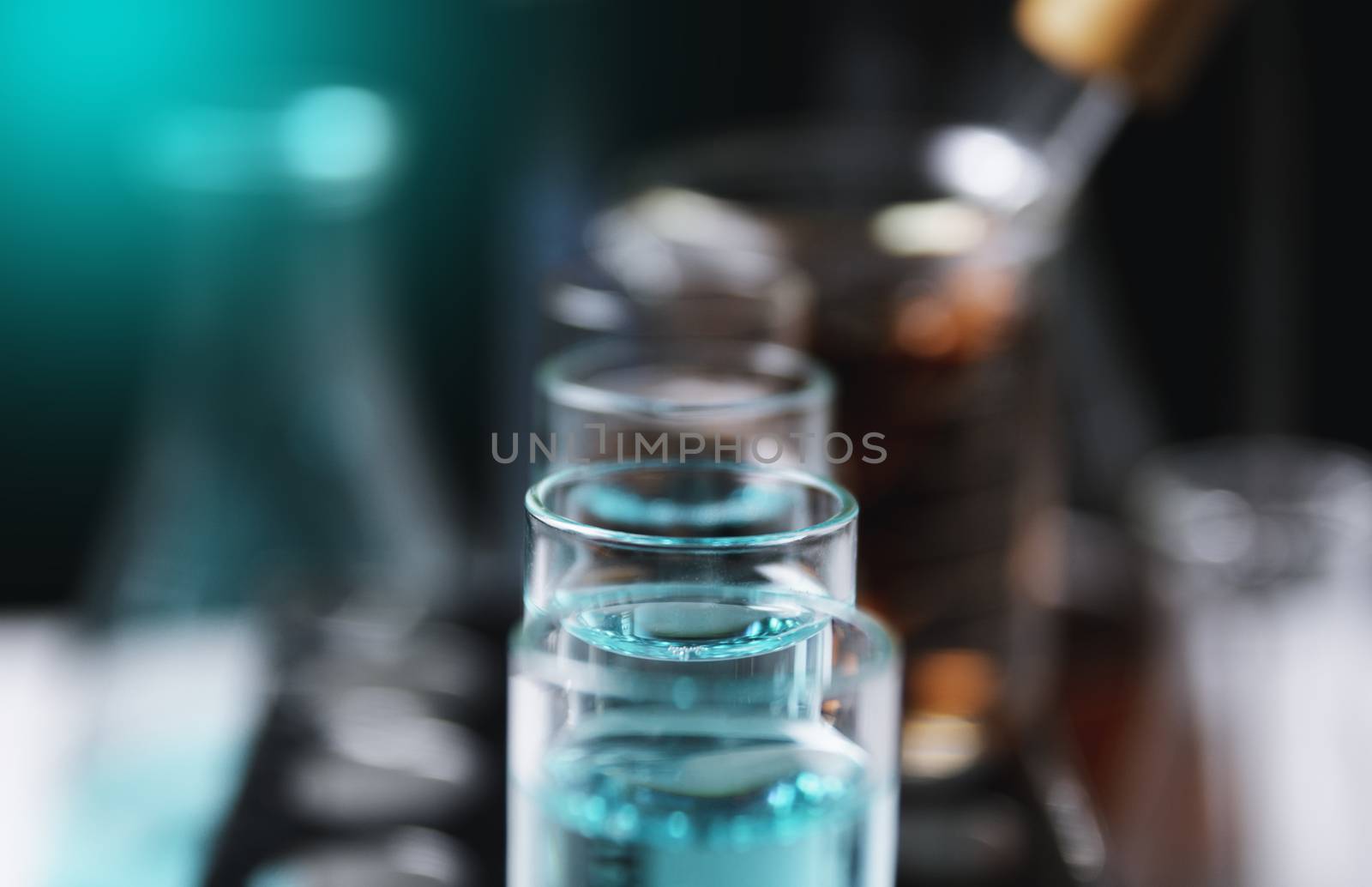 Glass laboratory chemical test tubes with liquid for analytical , medical, pharmaceutical and scientific research concept.