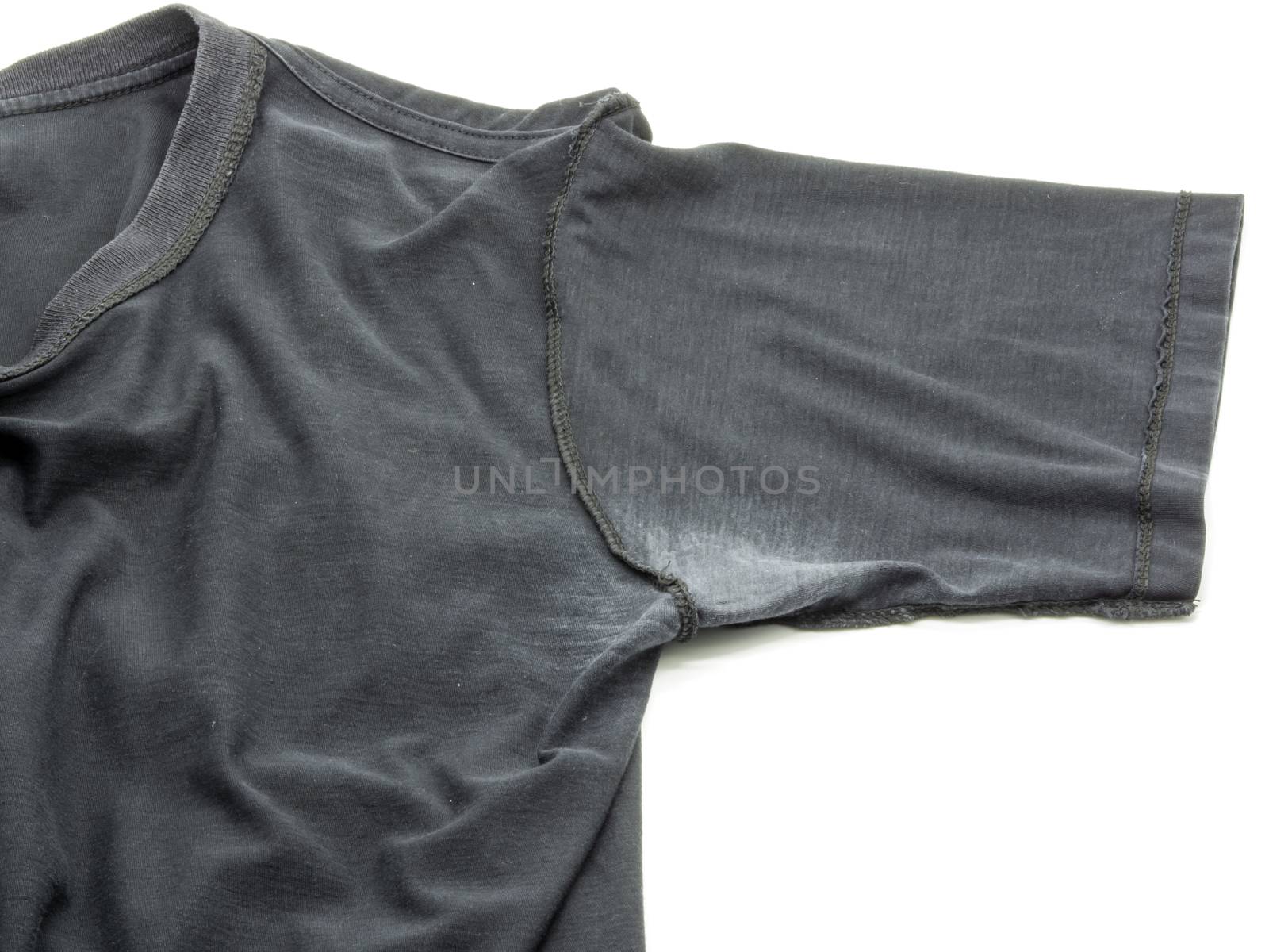 White stain under armpit on T-shirt isolated on white background.