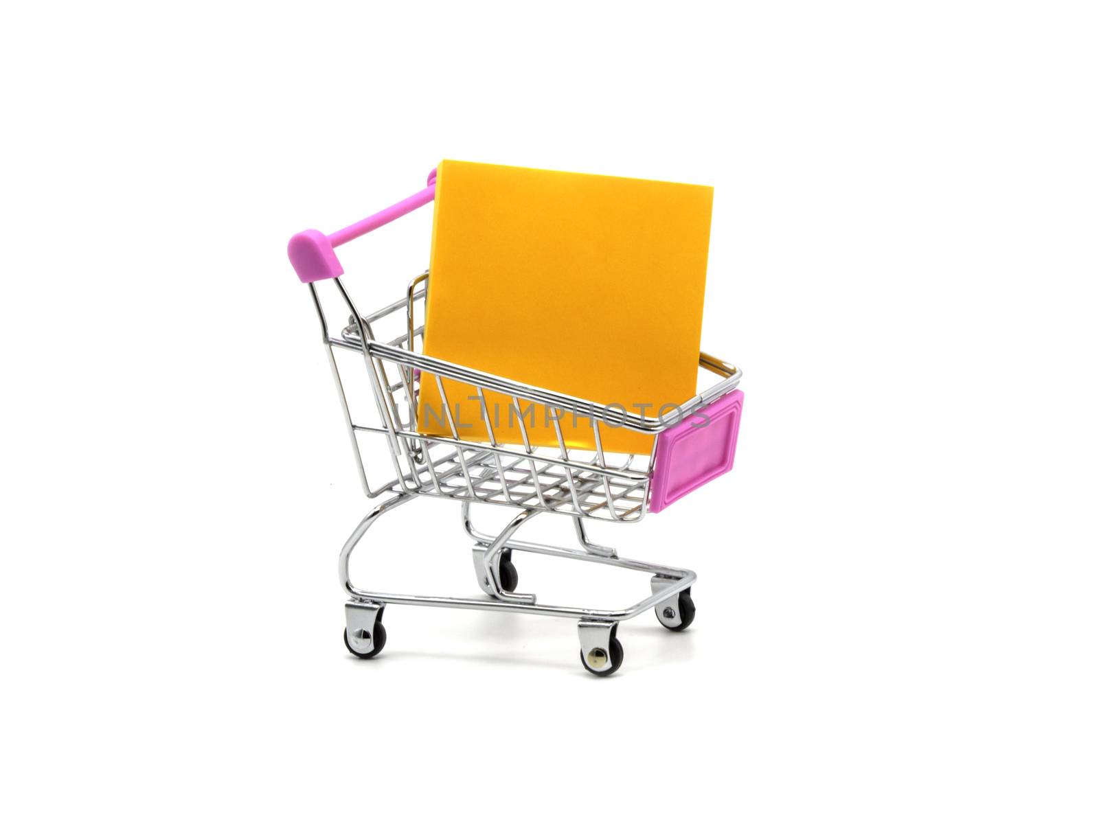 Sticky note and shopping cart isolated and white background.