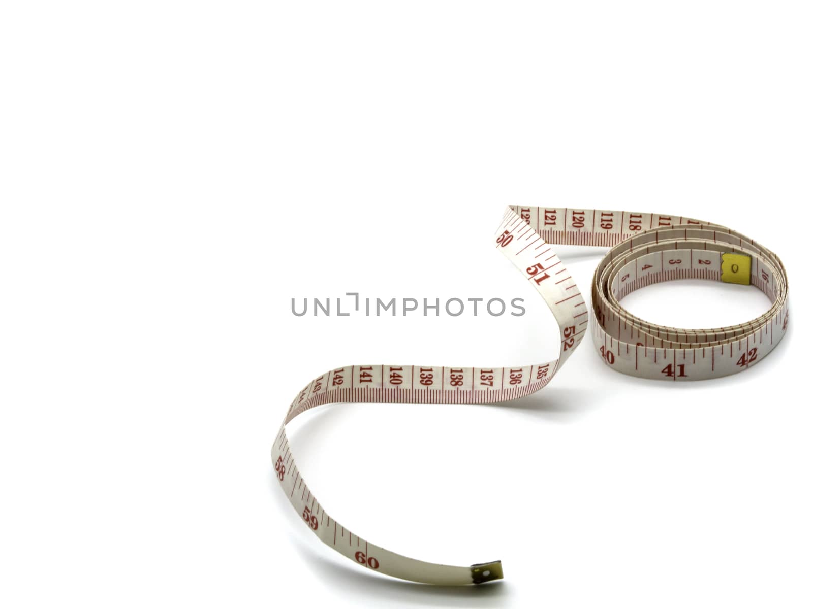 A soft tailor measuring tape isolated on a white background with copy space.