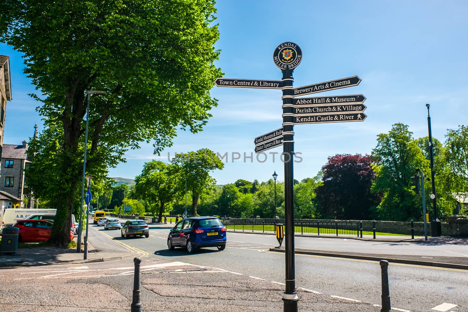 Town signpost showing directions to various places Kendal by paddythegolfer