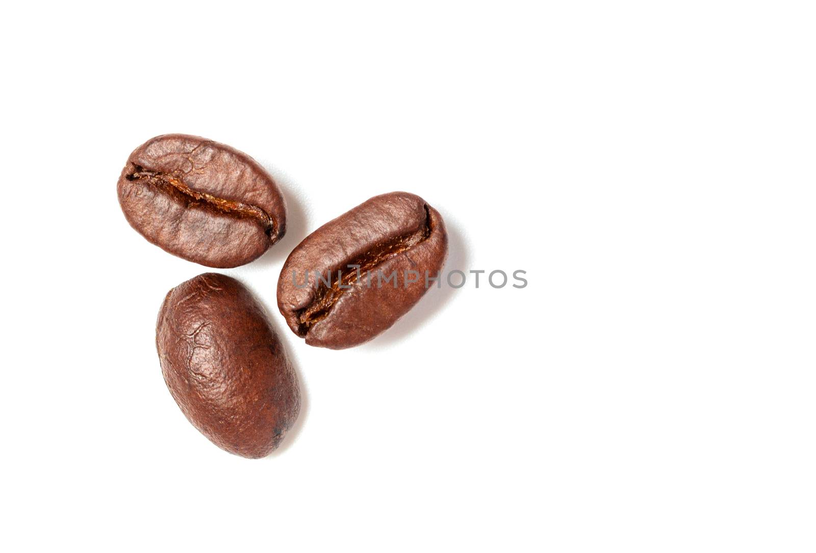 A spread coffee beans isolated on white background and copy spac by kirisa99