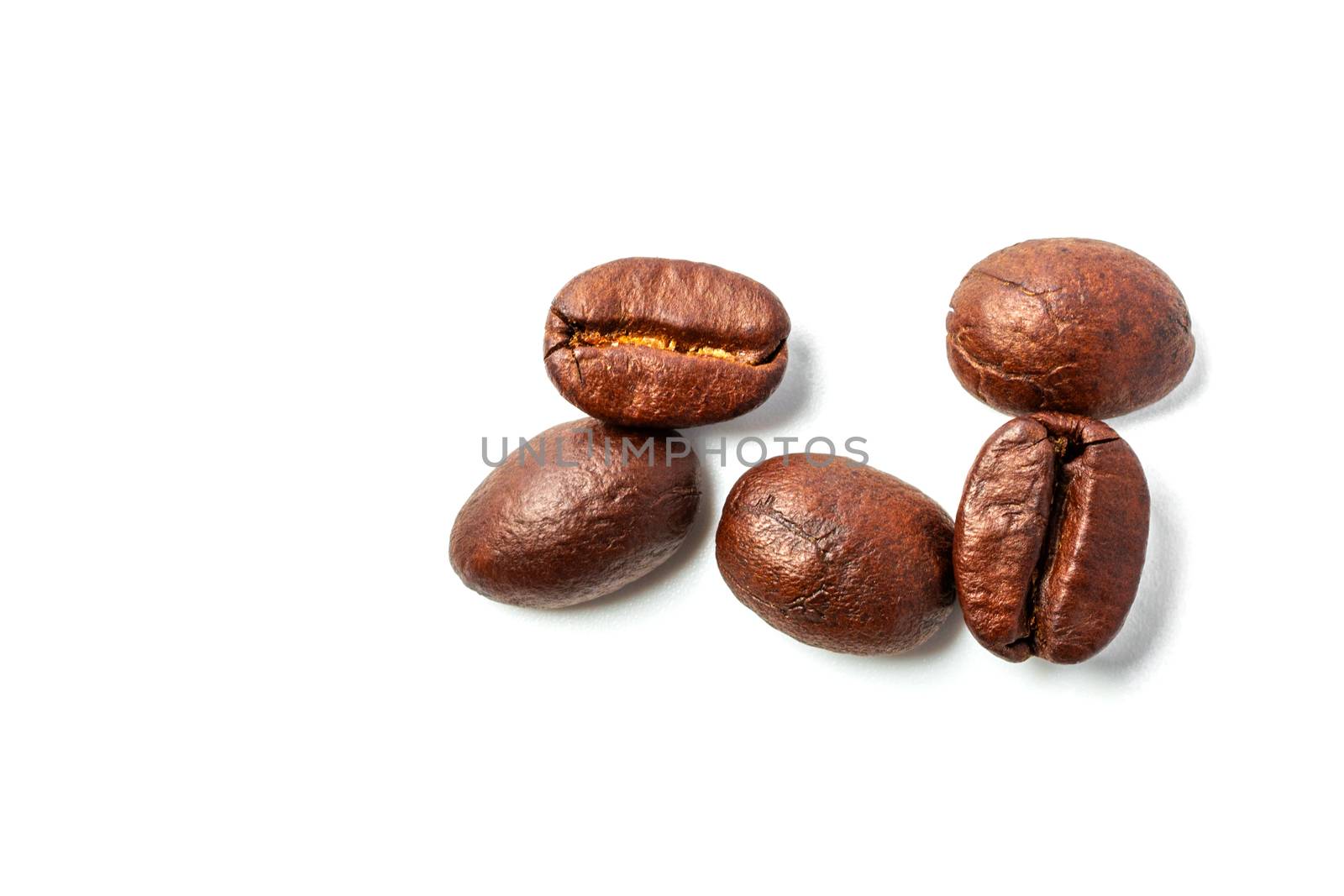 A spread coffee beans isolated on white background and copy space