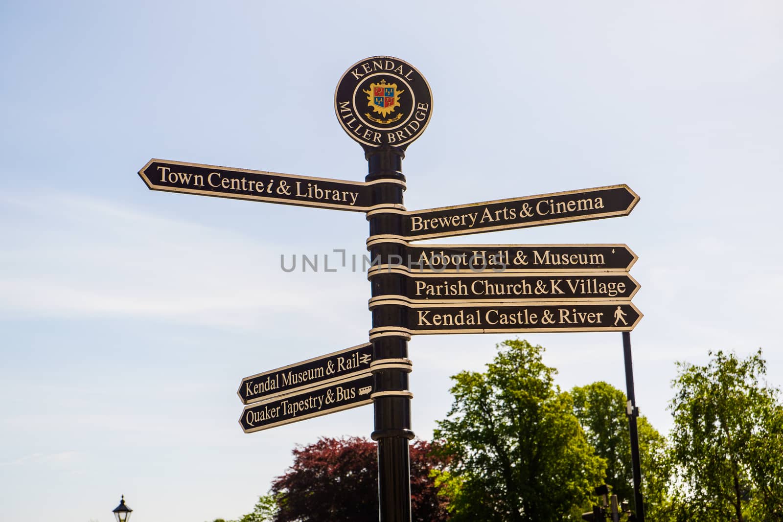 Town signpost showing directions to various places Kendal by paddythegolfer