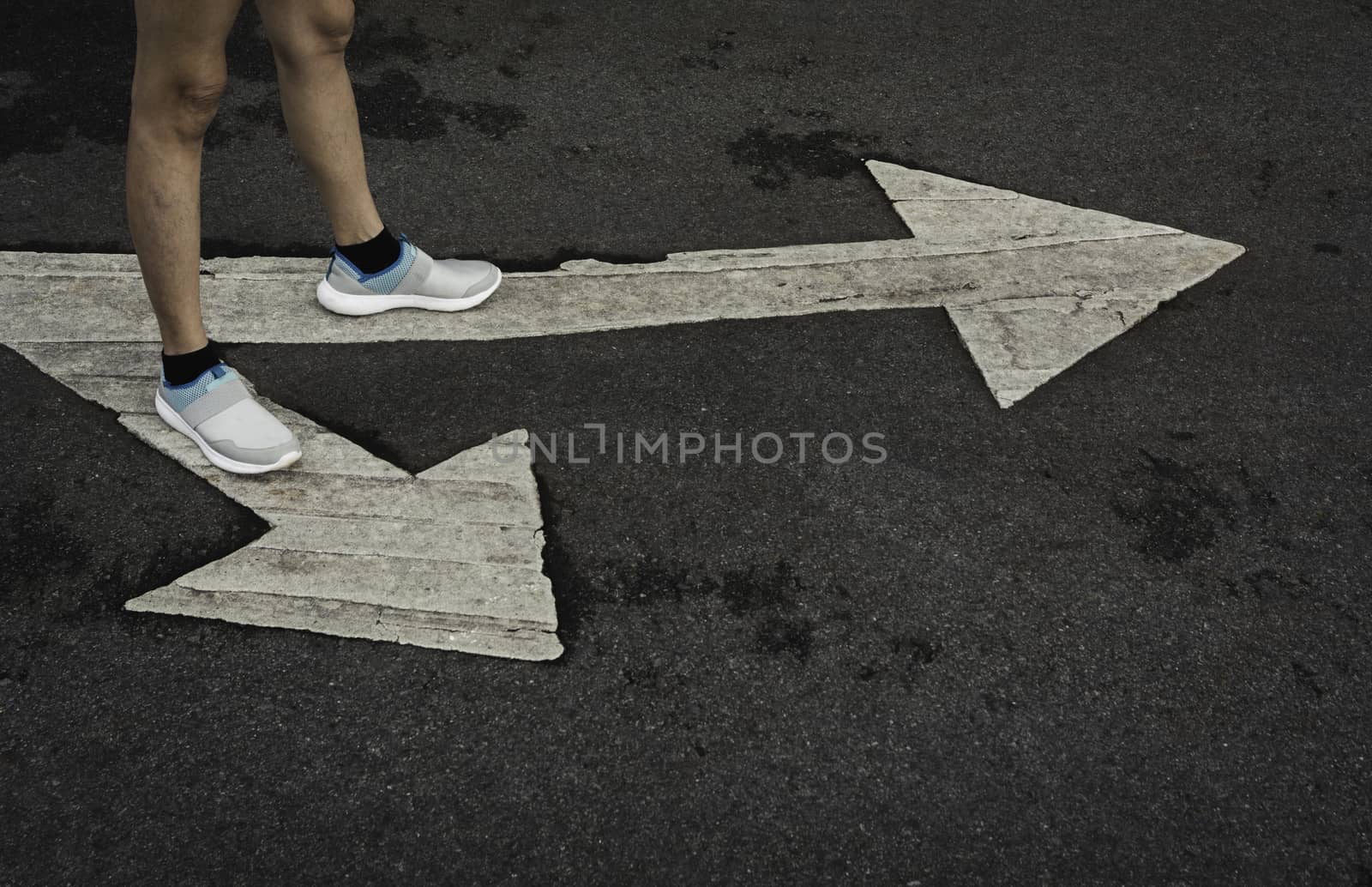 People standing at the crossroad and get to decision which way to go with copy space for insert text. Two ways to choose concept.