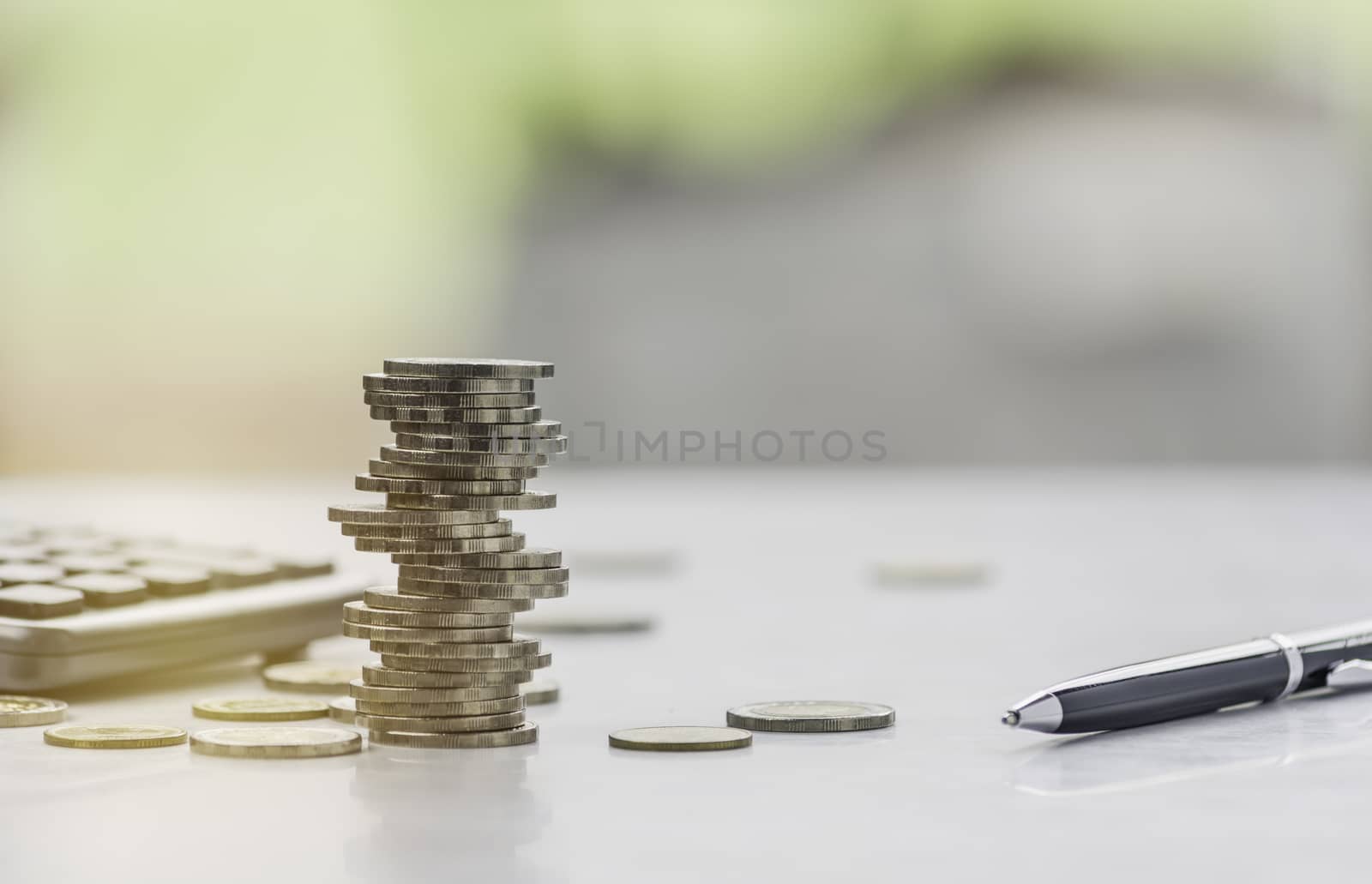 Saving money concept with money coin stack. Stack of coins with copy space for business and accounting concept.