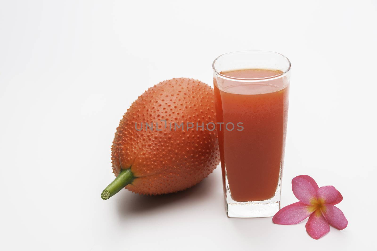 Baby Jackfruit, Gac fruit with baby jackfruit juice isolated on white background. Drink and healthy concept.