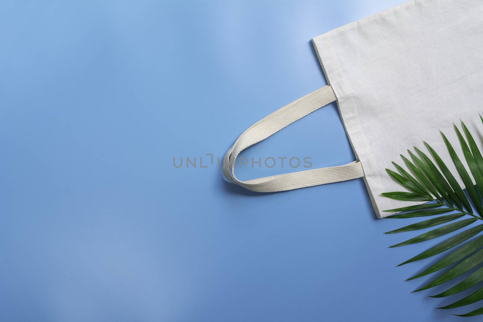 White tote bag canvas fabric. Cloth shopping sack mockup with copy space.